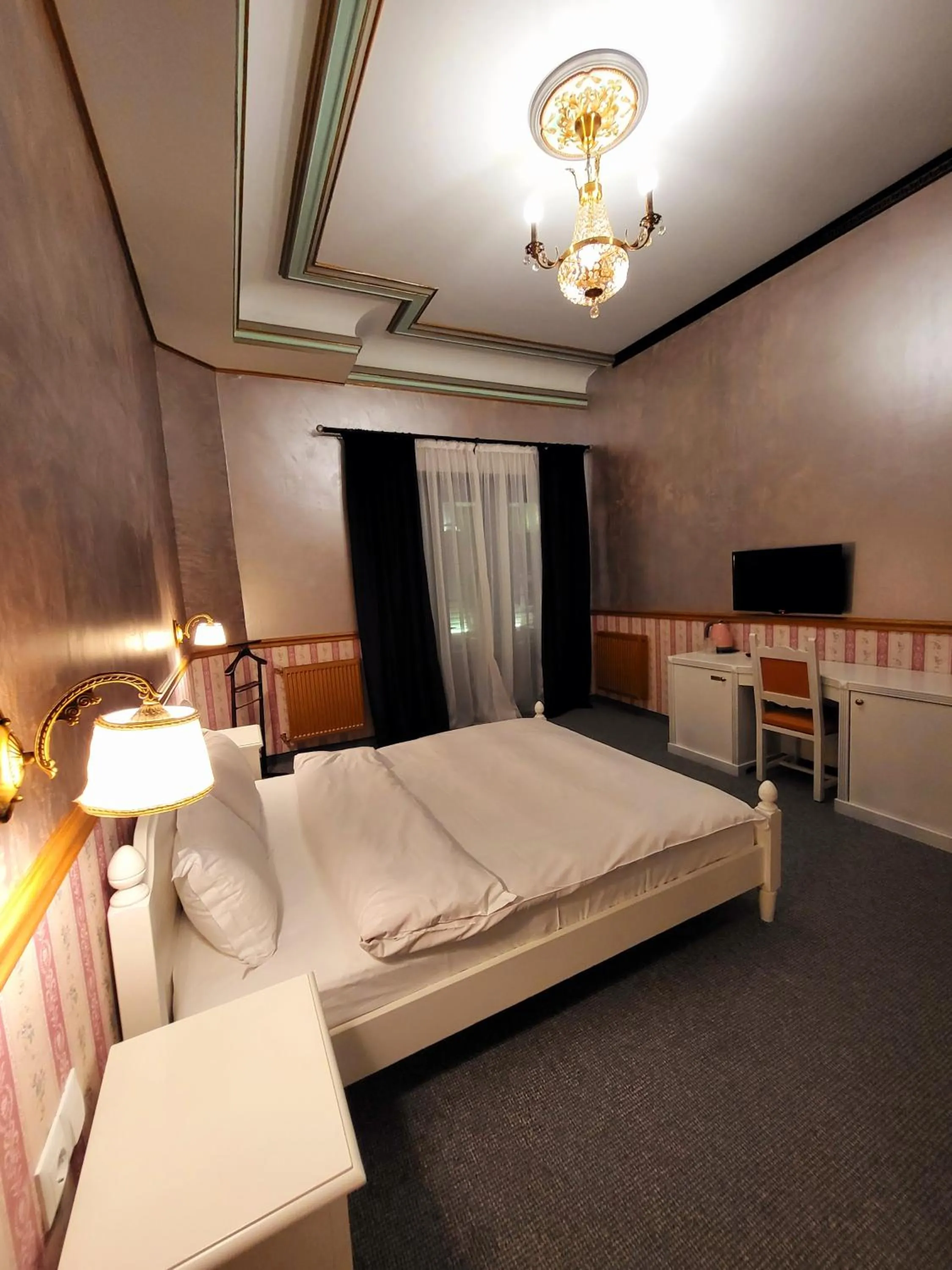 Bed in NF Palace Old City Bucharest