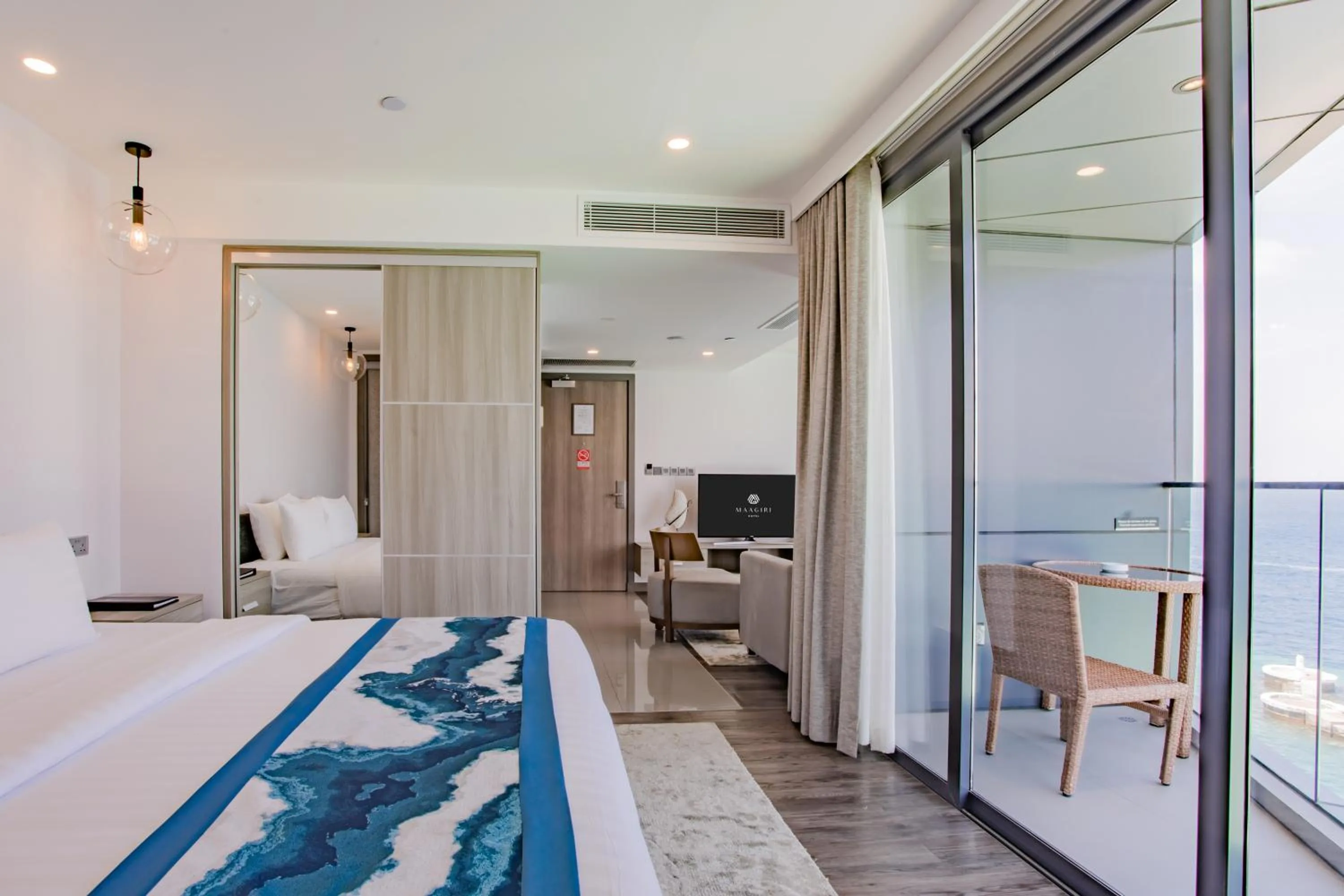 Balcony/Terrace, Bed in Maagiri Hotel