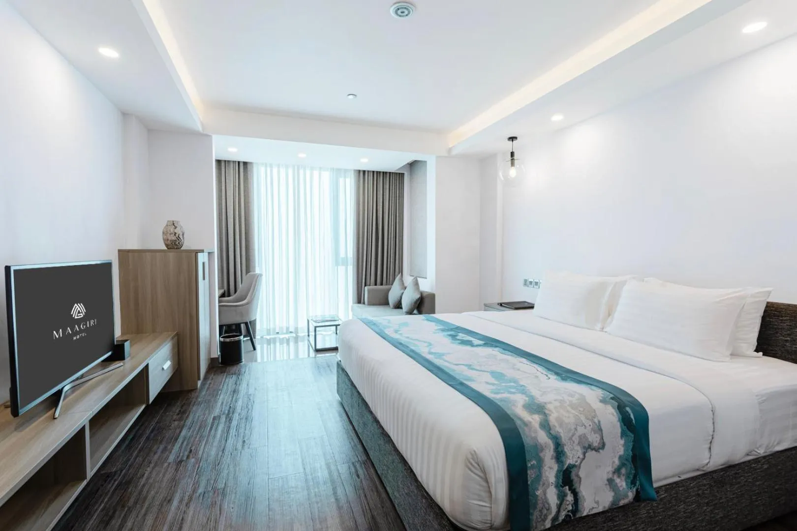 Bed in Maagiri Hotel