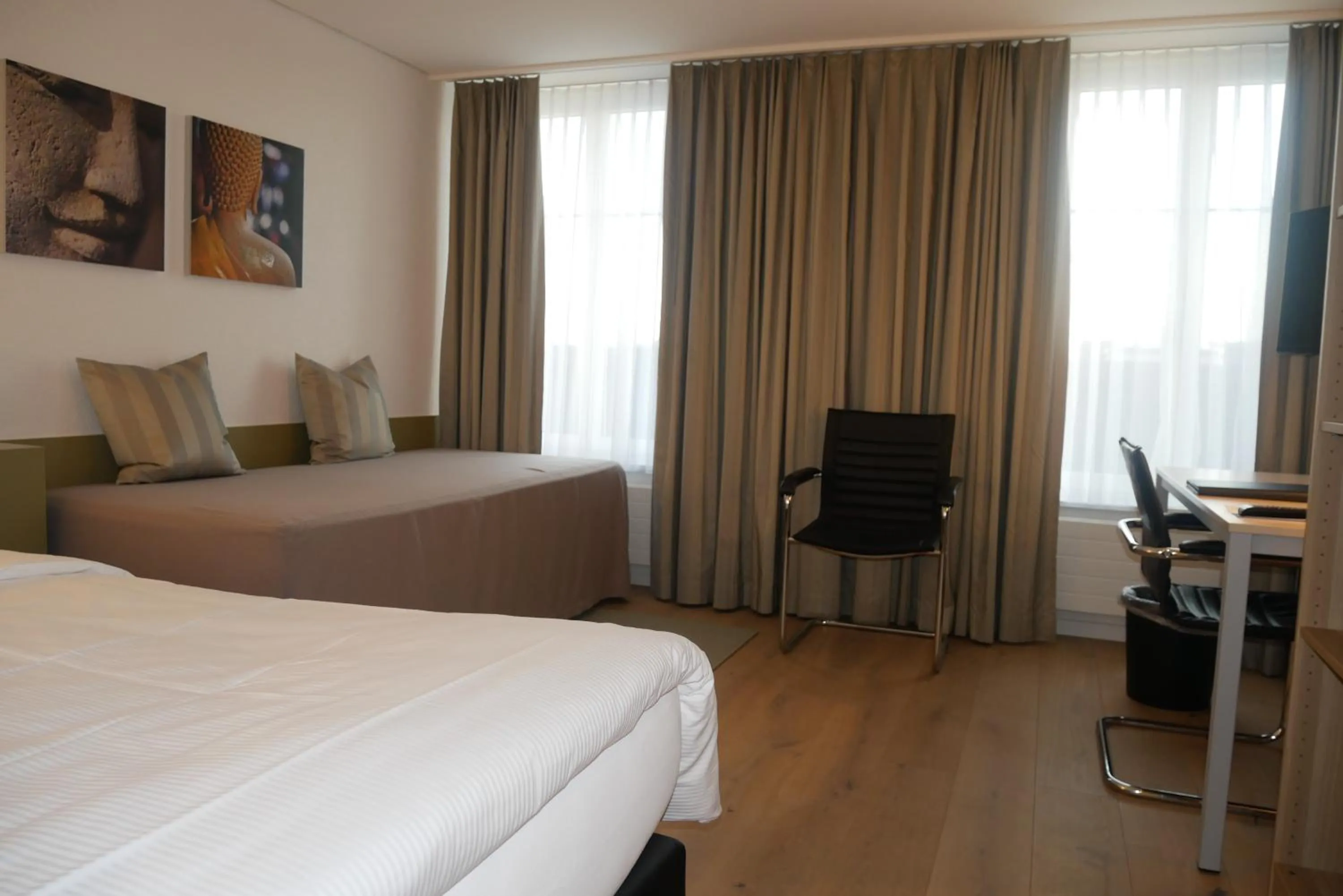 Photo of the whole room, Bed in Hotel Schwanen Wil
