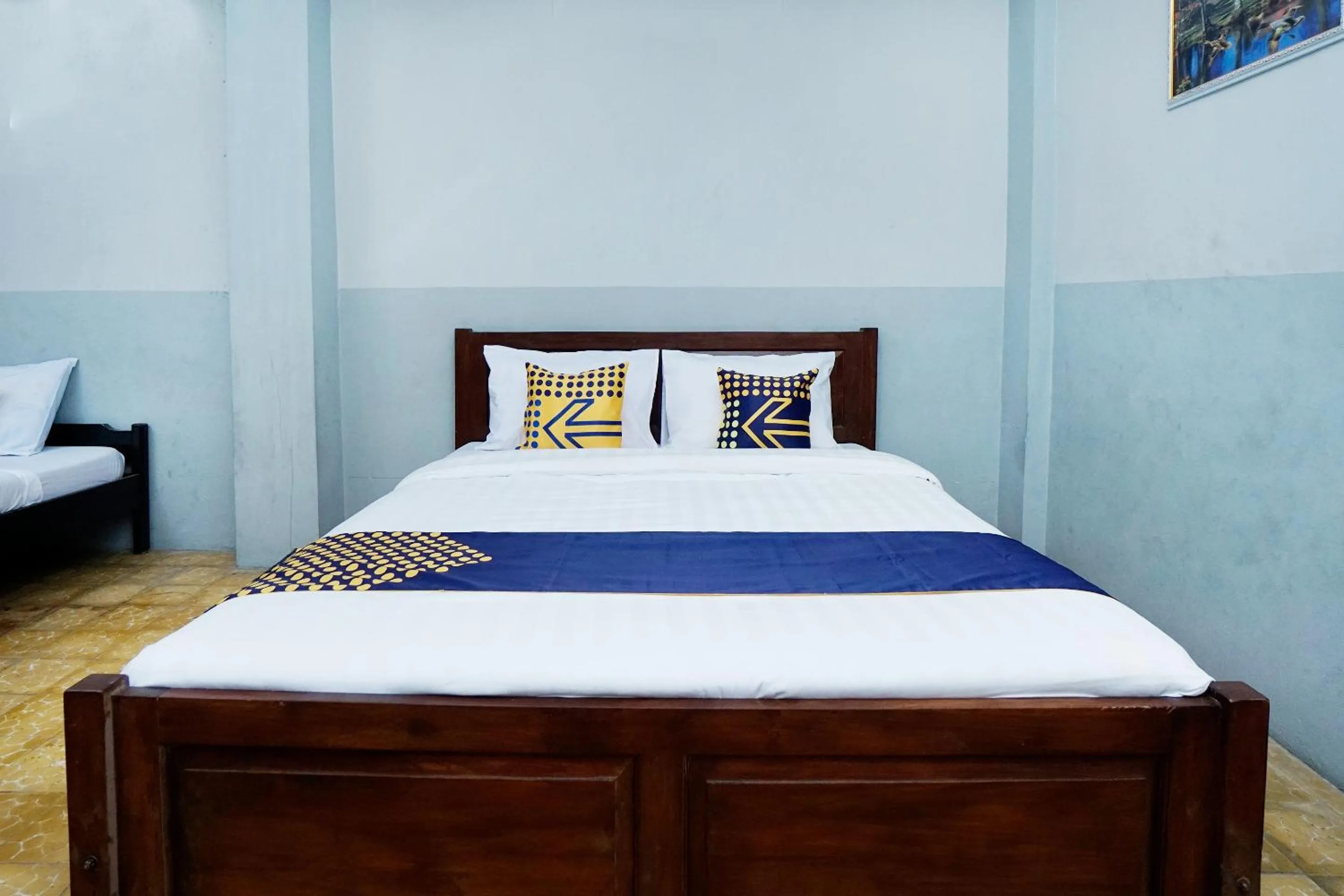 Bedroom in SPOT ON 2857 Hotel Pelangi