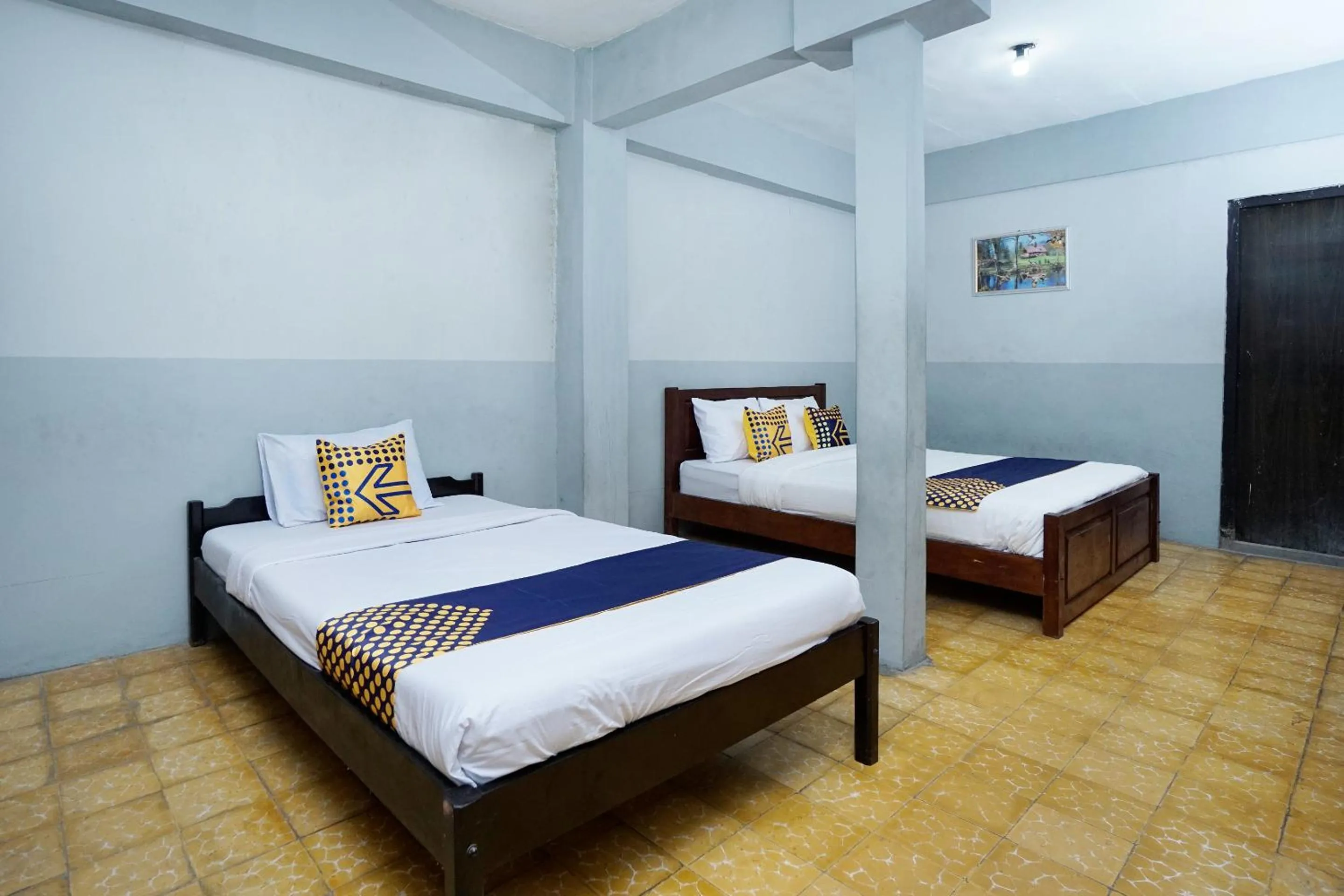 Bedroom in SPOT ON 2857 Hotel Pelangi