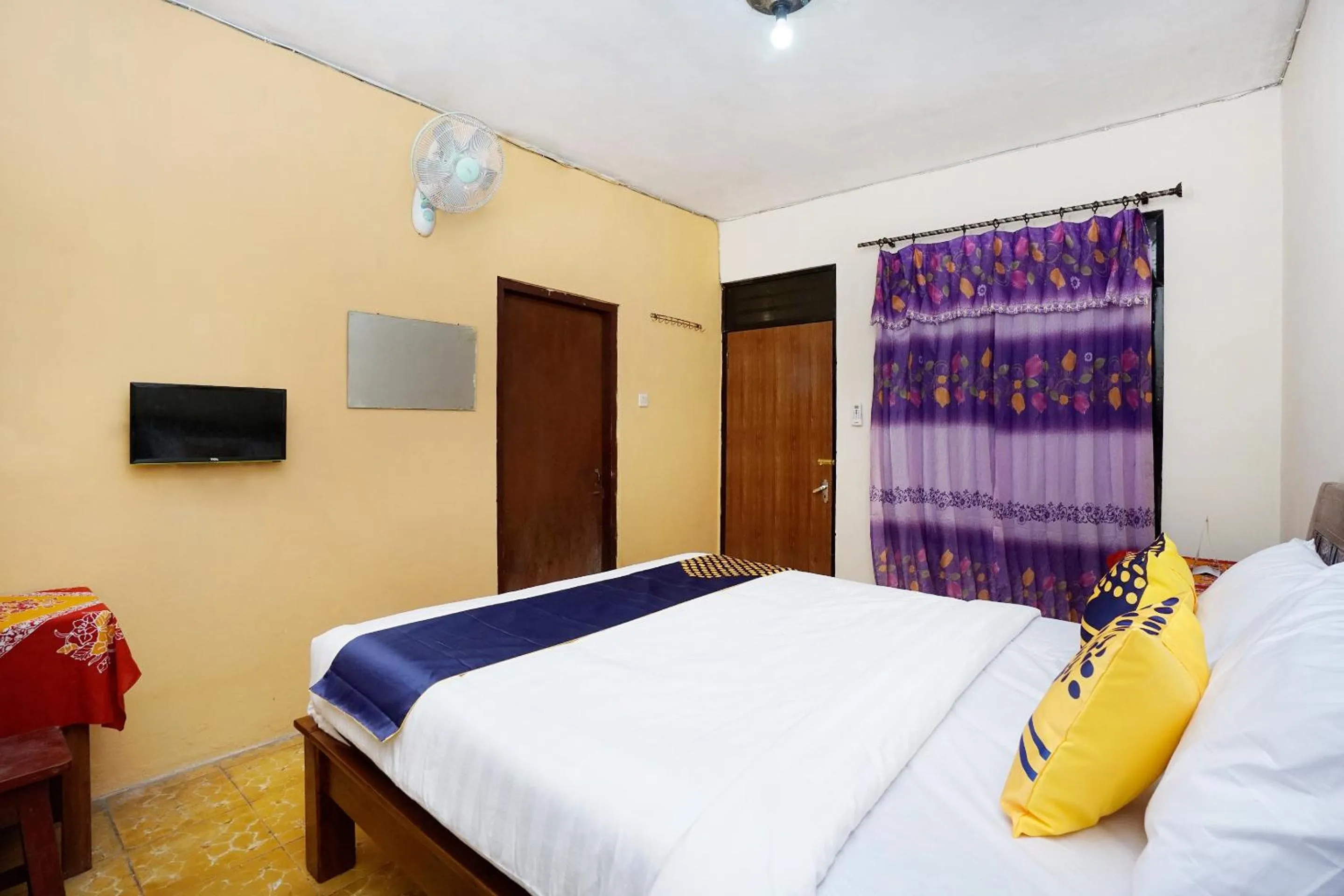 Bedroom in SPOT ON 2857 Hotel Pelangi