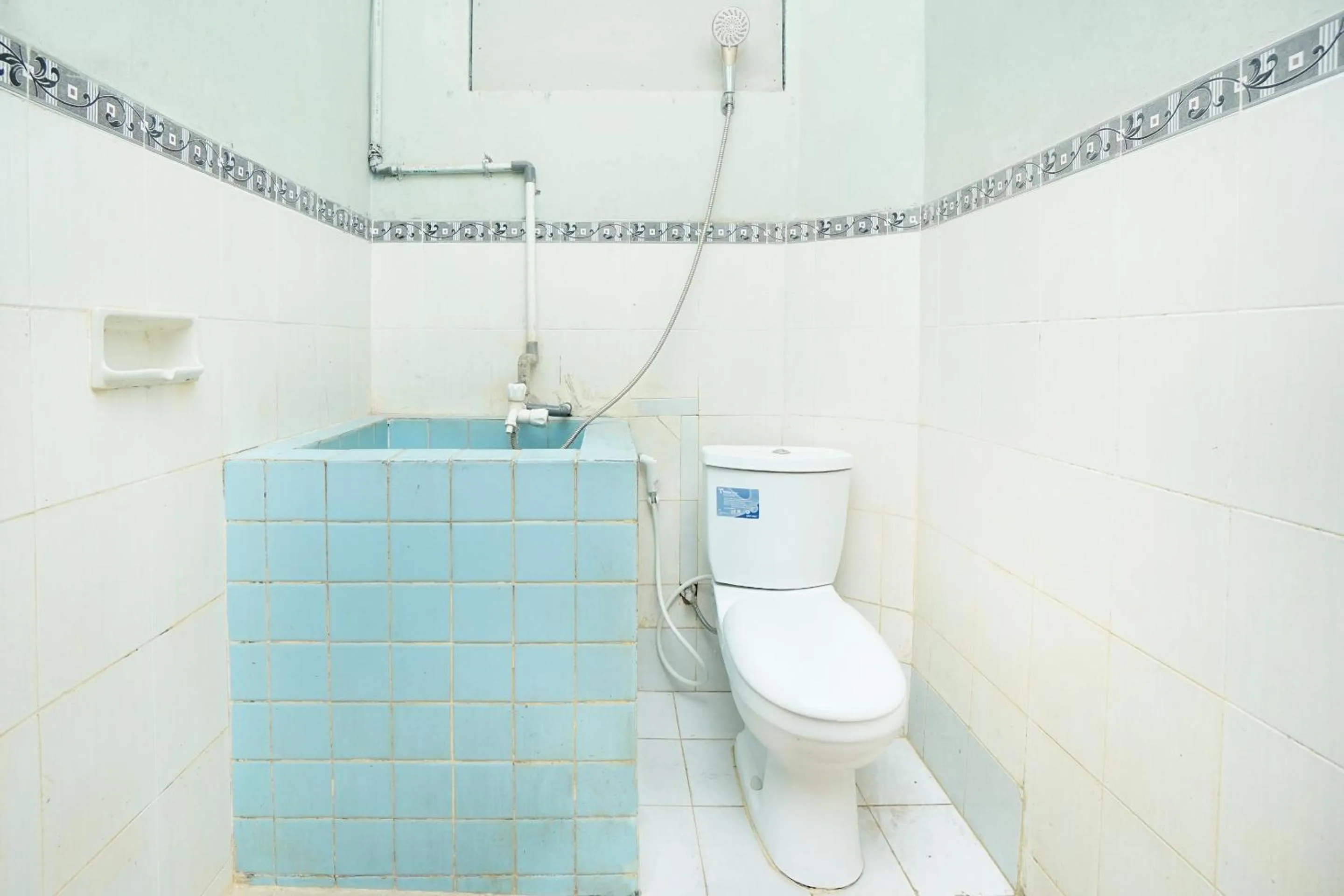 Bathroom in SPOT ON 2857 Hotel Pelangi