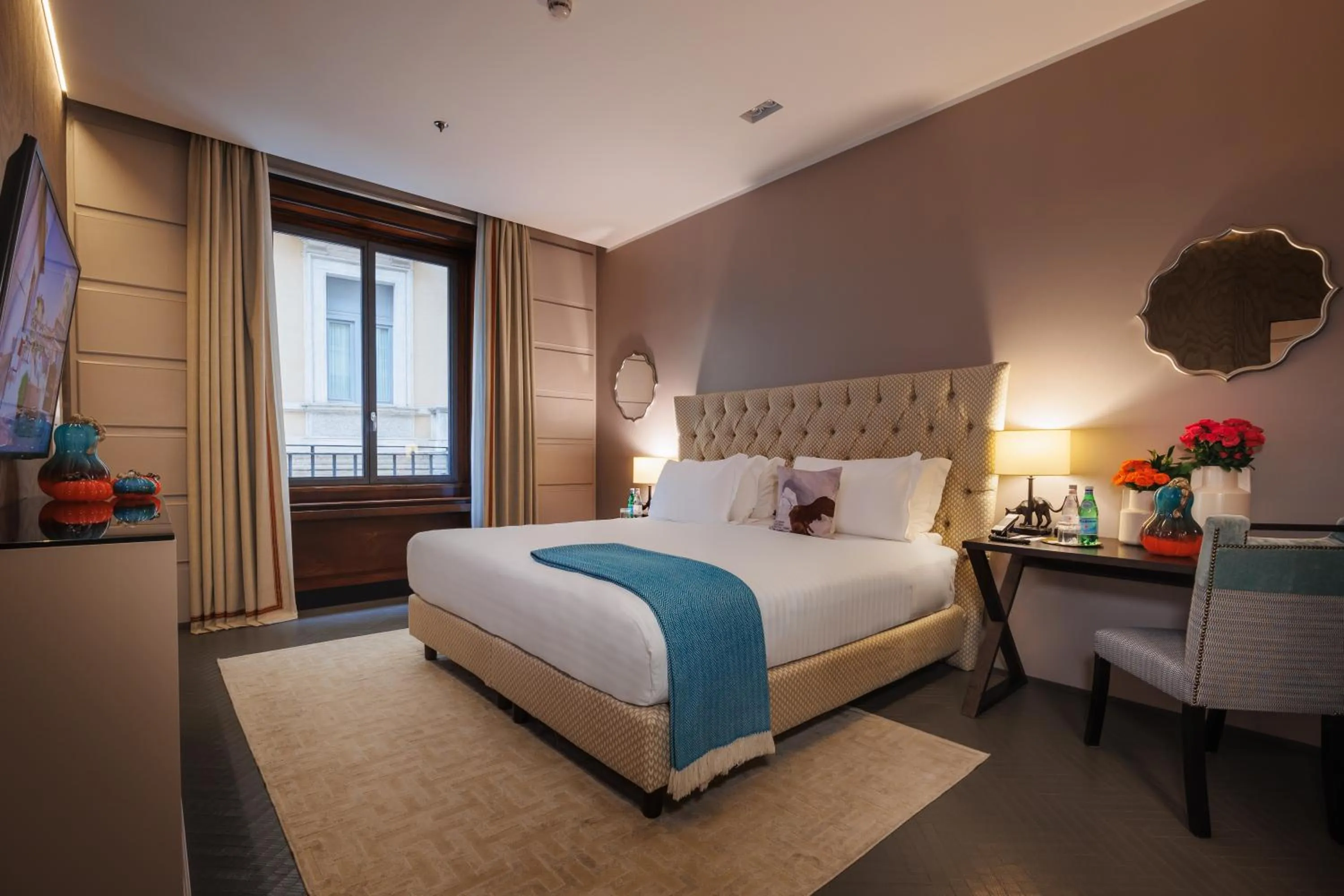 Bed in Singer Palace Hotel Roma