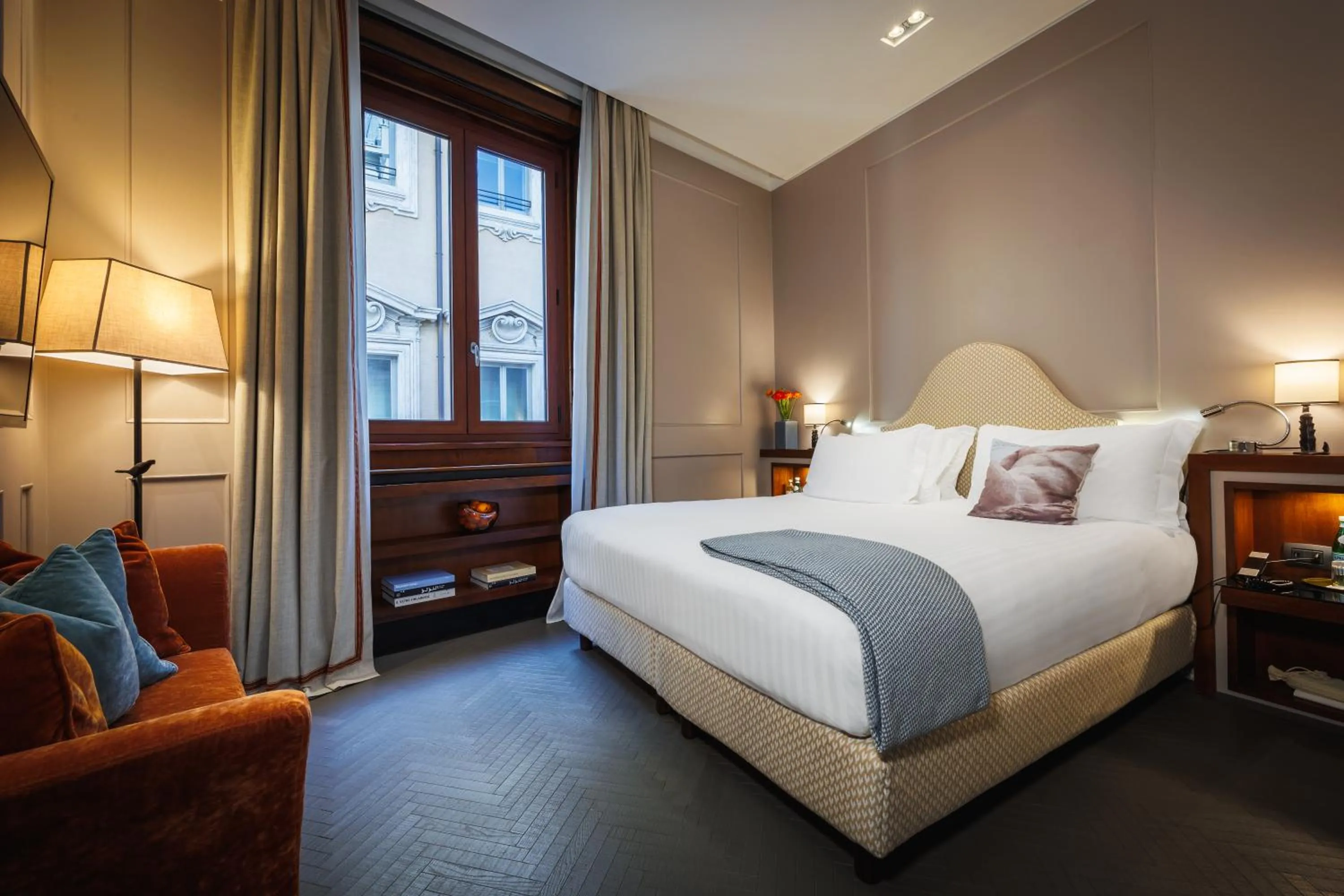 Bed in Singer Palace Hotel Roma