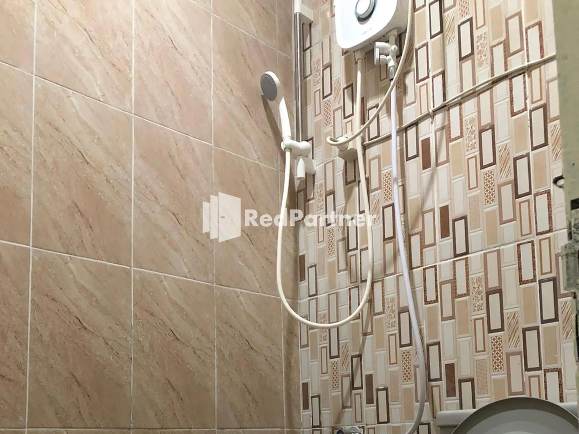 Bathroom in Seungit Syariah Inn Tebet Mitra RedDoorz