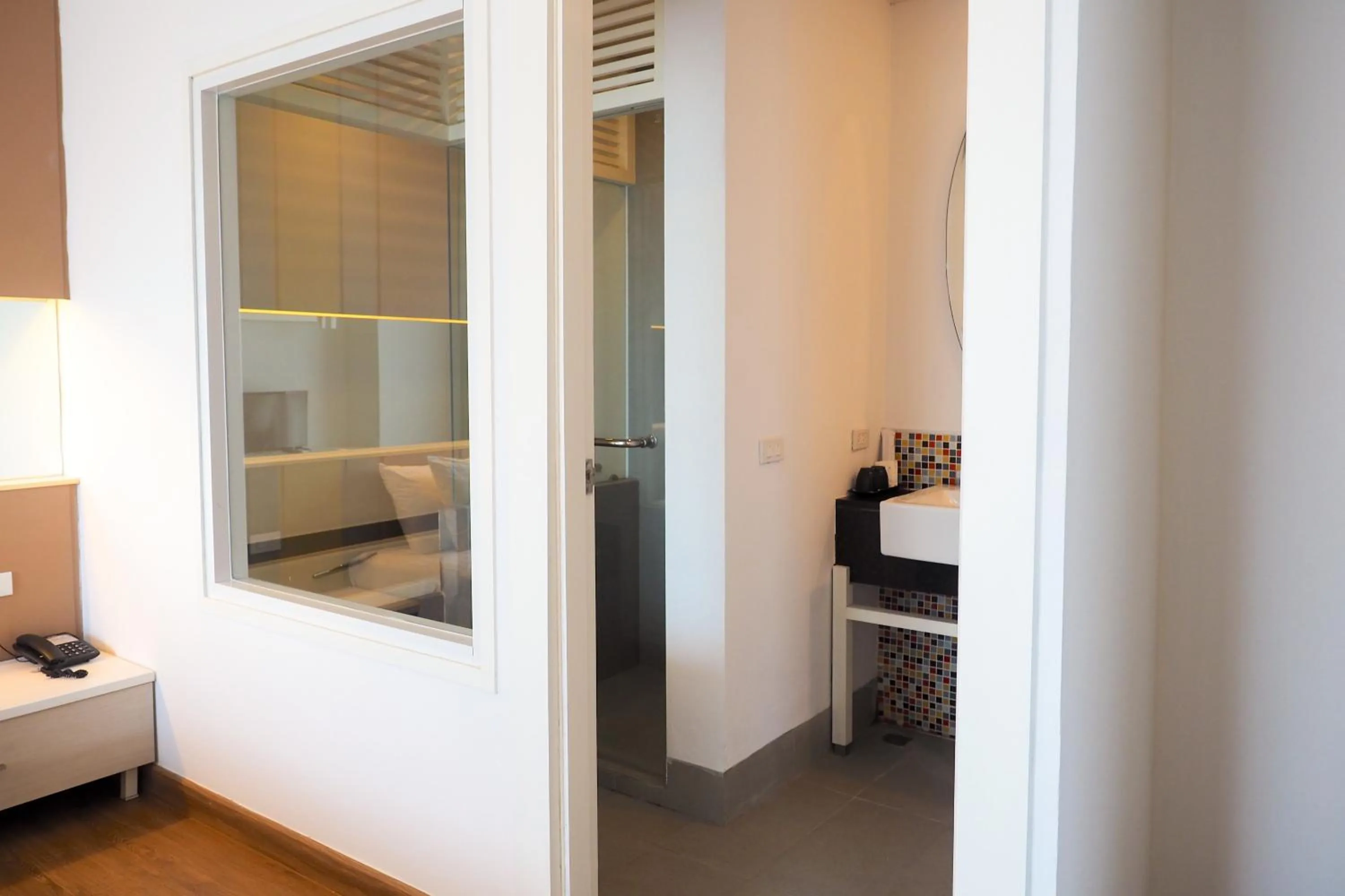 Bathroom, Bed in THE KANNAS Hotel & Serviced Apartment, Chiang Mai SHA Certified