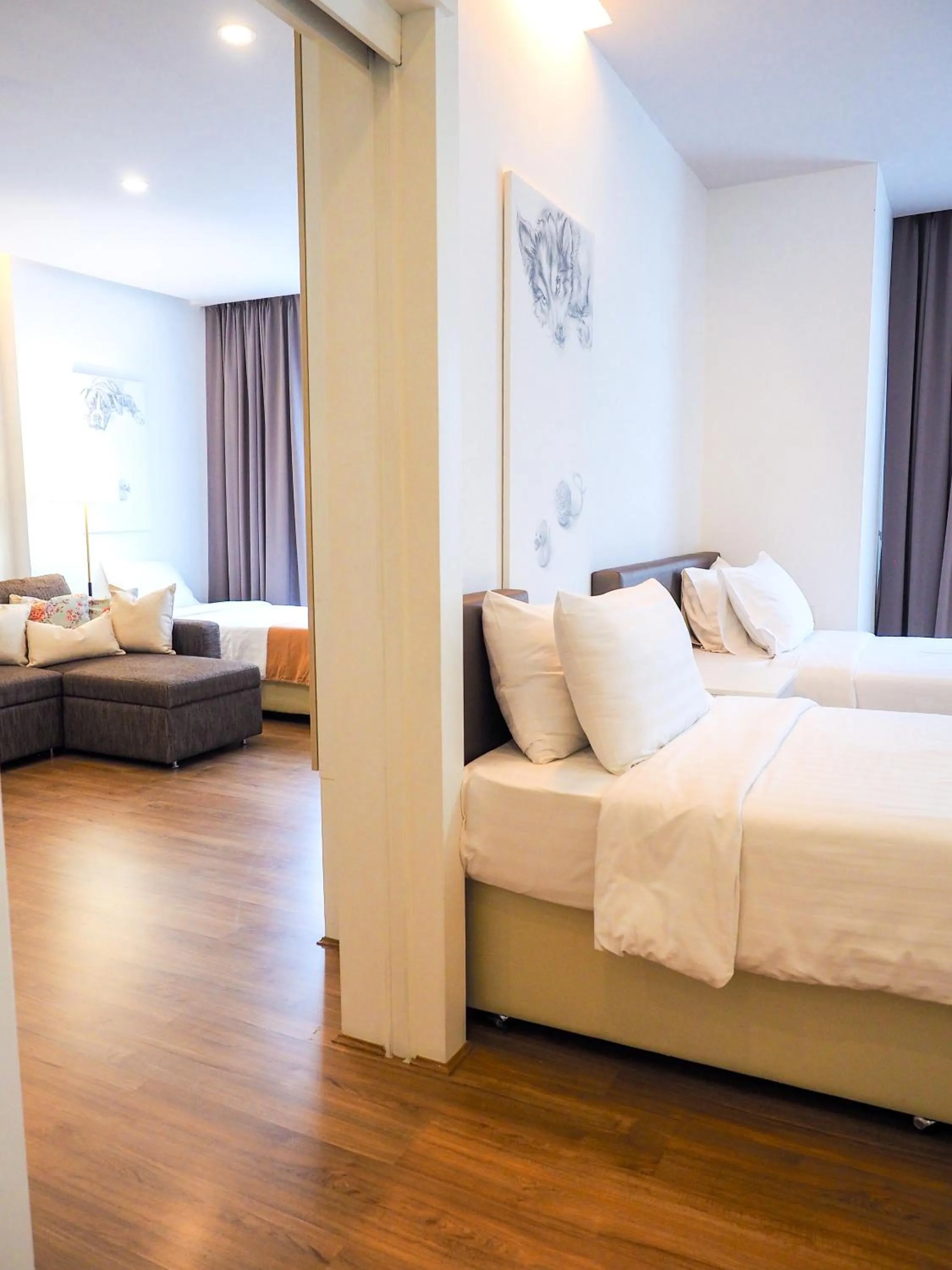 Bed in THE KANNAS Hotel & Serviced Apartment, Chiang Mai SHA Certified