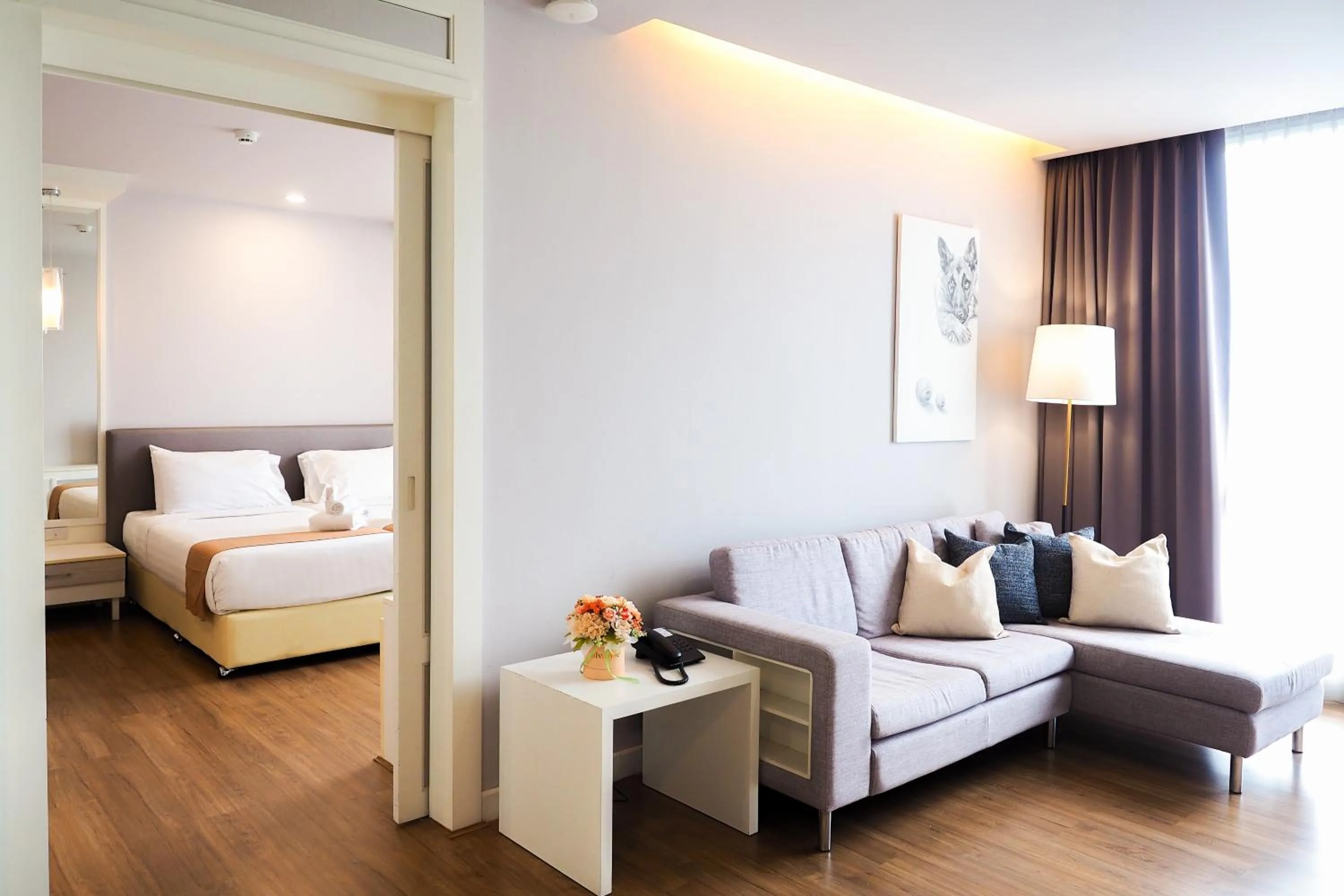 Bed in THE KANNAS Hotel & Serviced Apartment, Chiang Mai SHA Certified