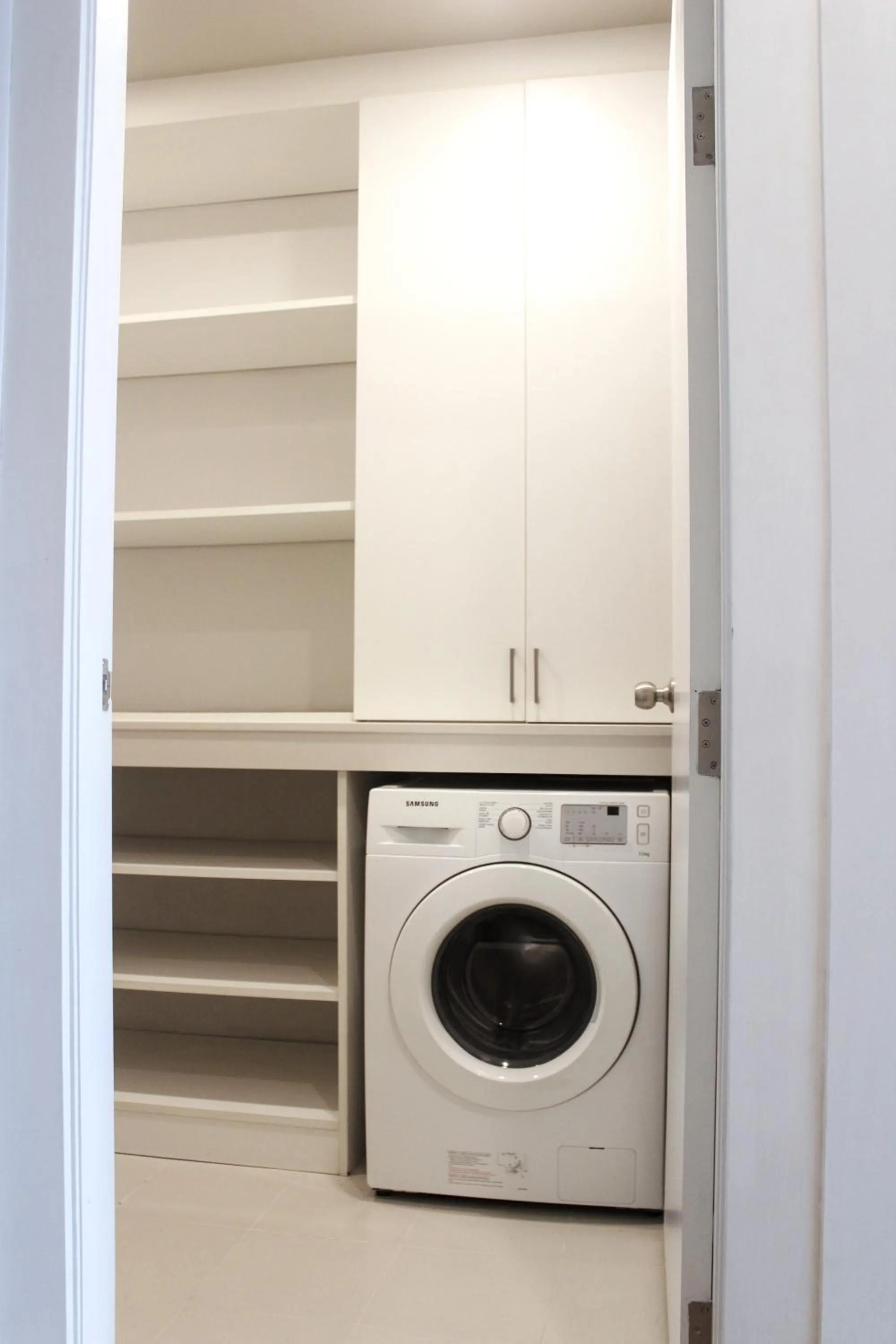 washing machine in THE KANNAS Hotel & Serviced Apartment, Chiang Mai SHA Certified