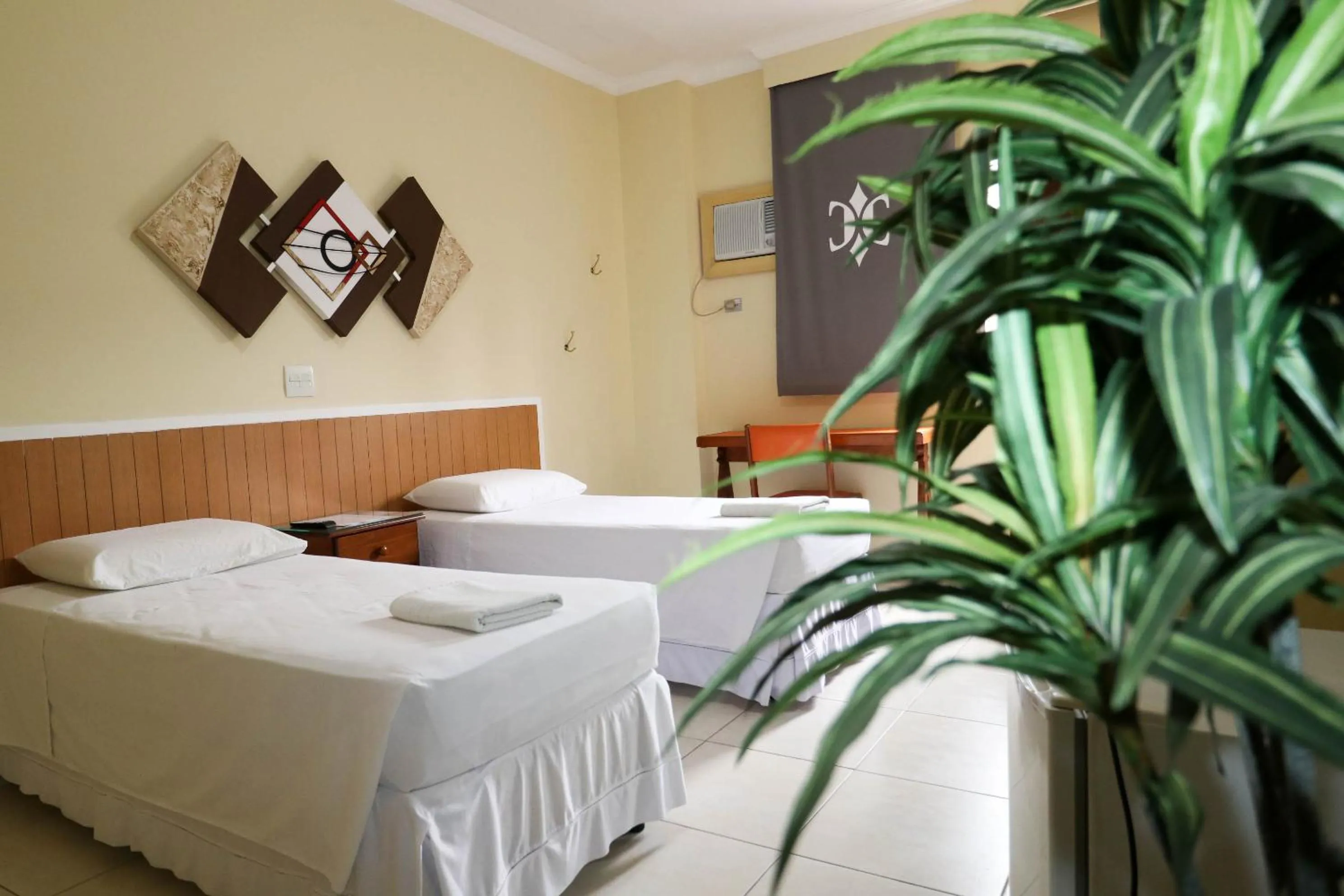 Bed in Charme Hotel Guarujá Frente Mar