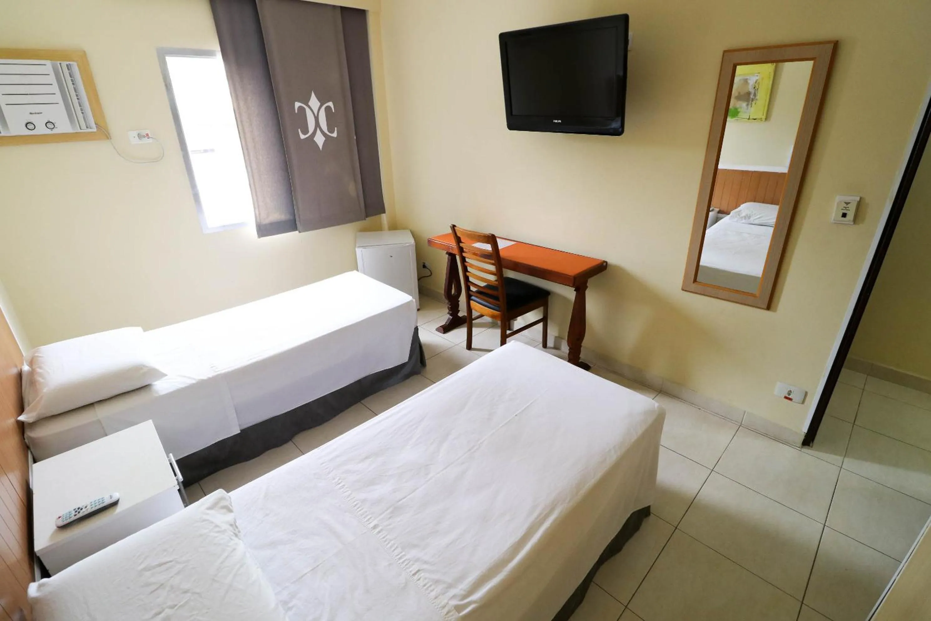 Bed in Charme Hotel Guarujá Frente Mar