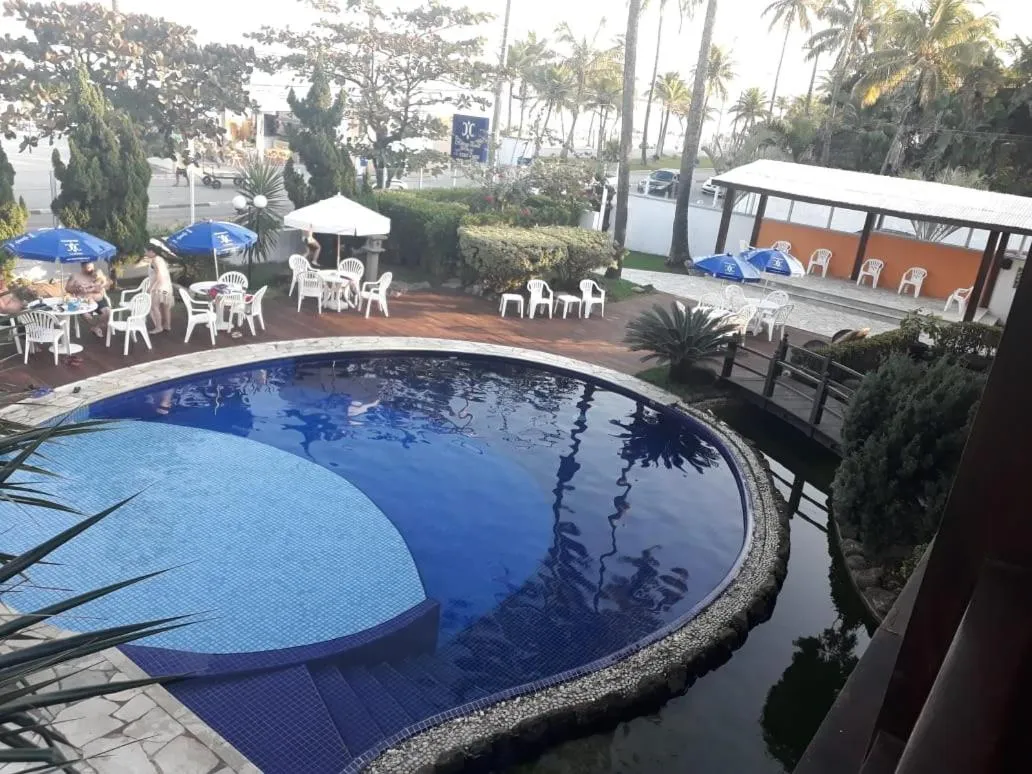 Swimming pool in Charme Hotel Guarujá Frente Mar