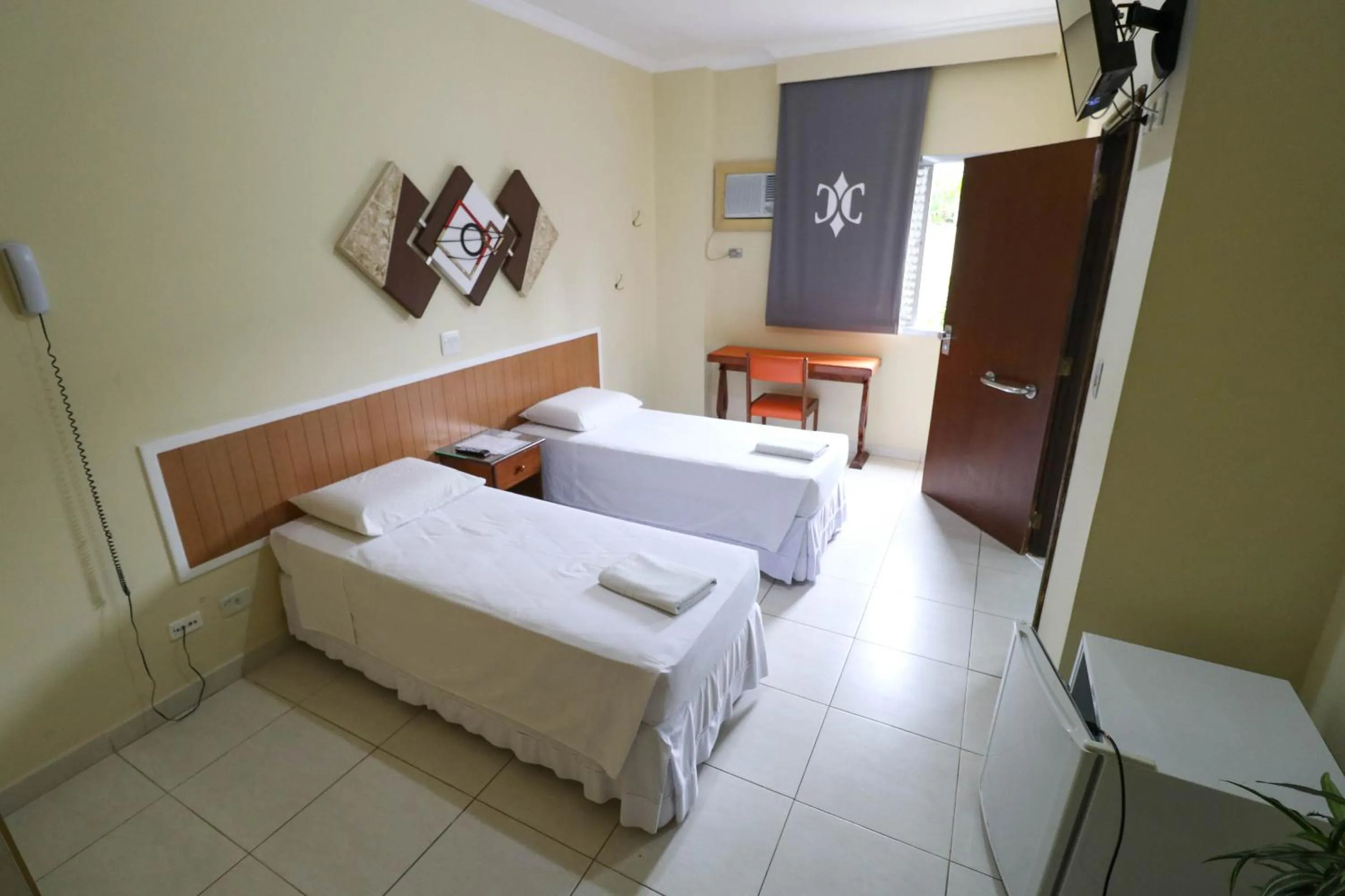 Bed in Charme Hotel Guarujá Frente Mar