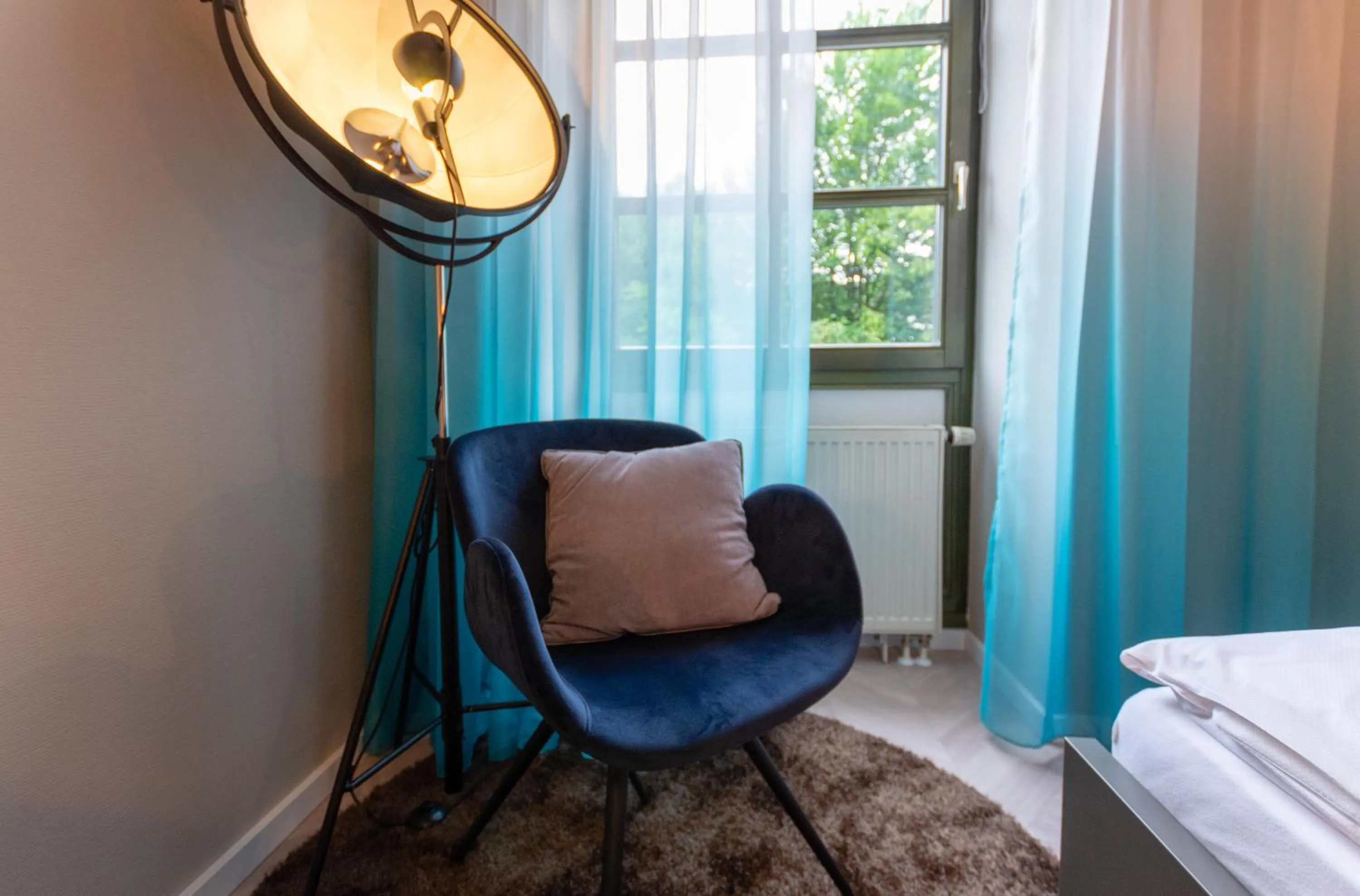 Seating area, Bed in Arthotel ANA Aura