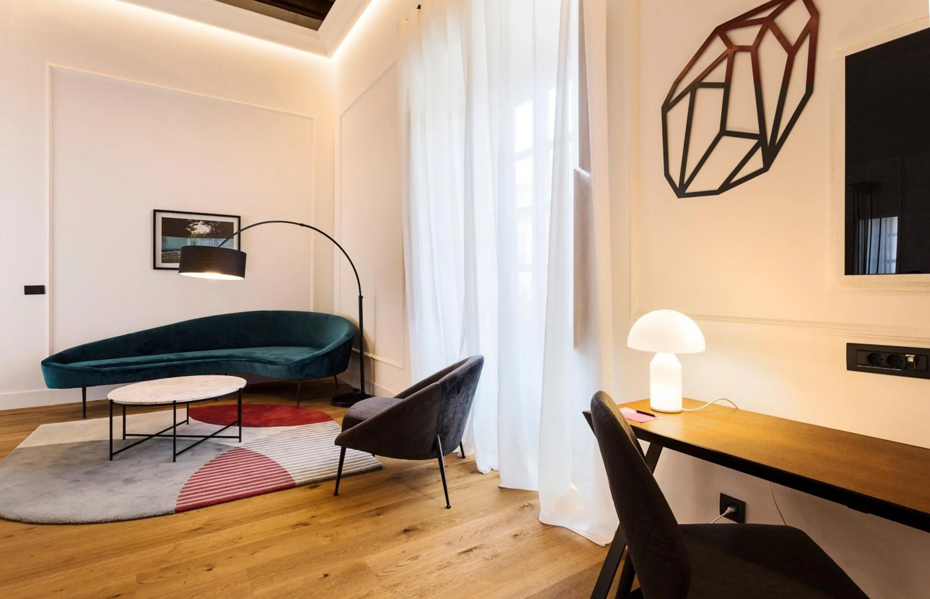 Seating area in One Shot Conde Torrejón