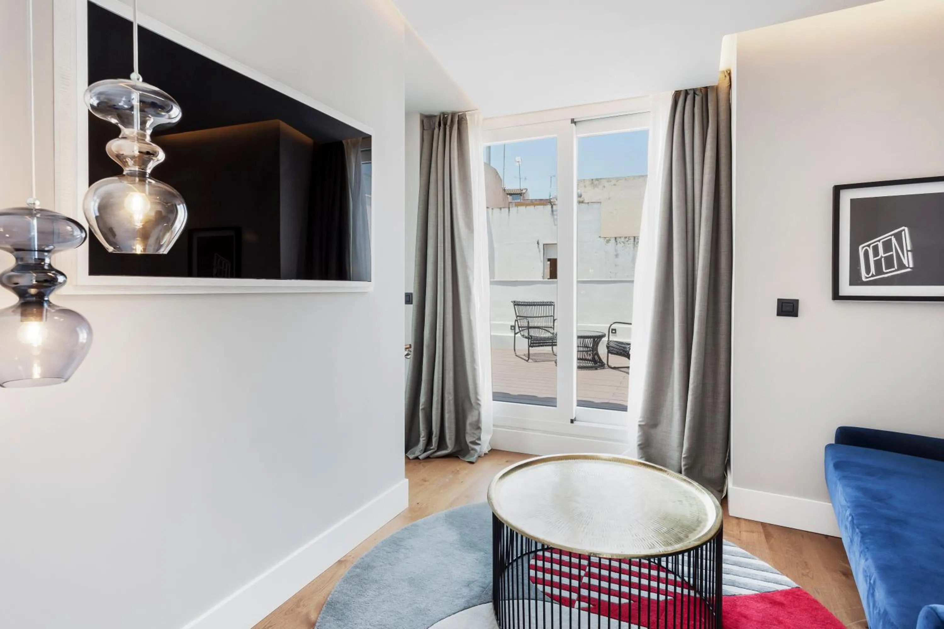 Seating area in One Shot Conde Torrejón