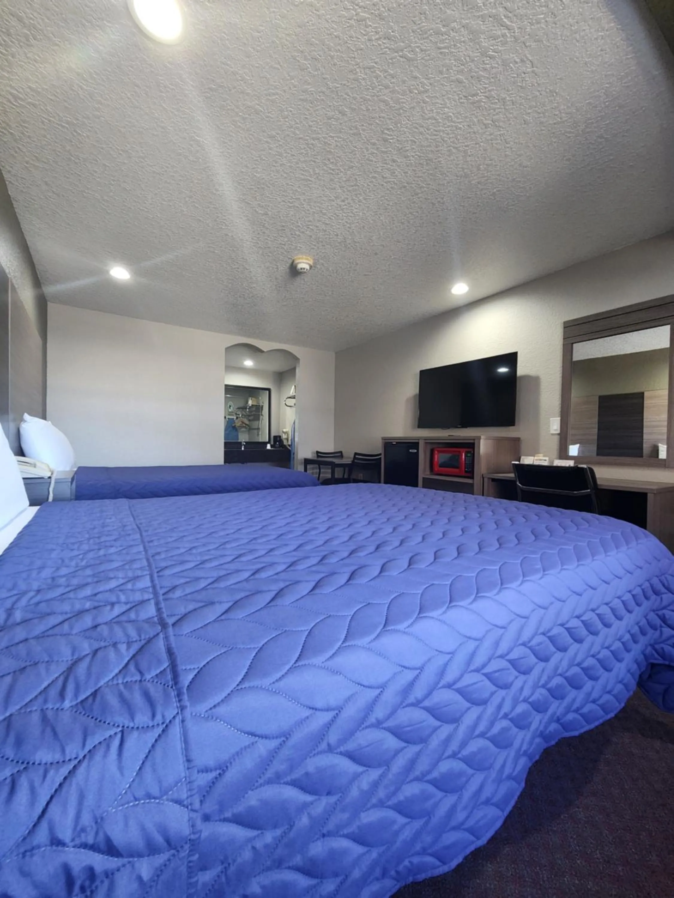 Bed in Scottish Inn and Suites Beaumont