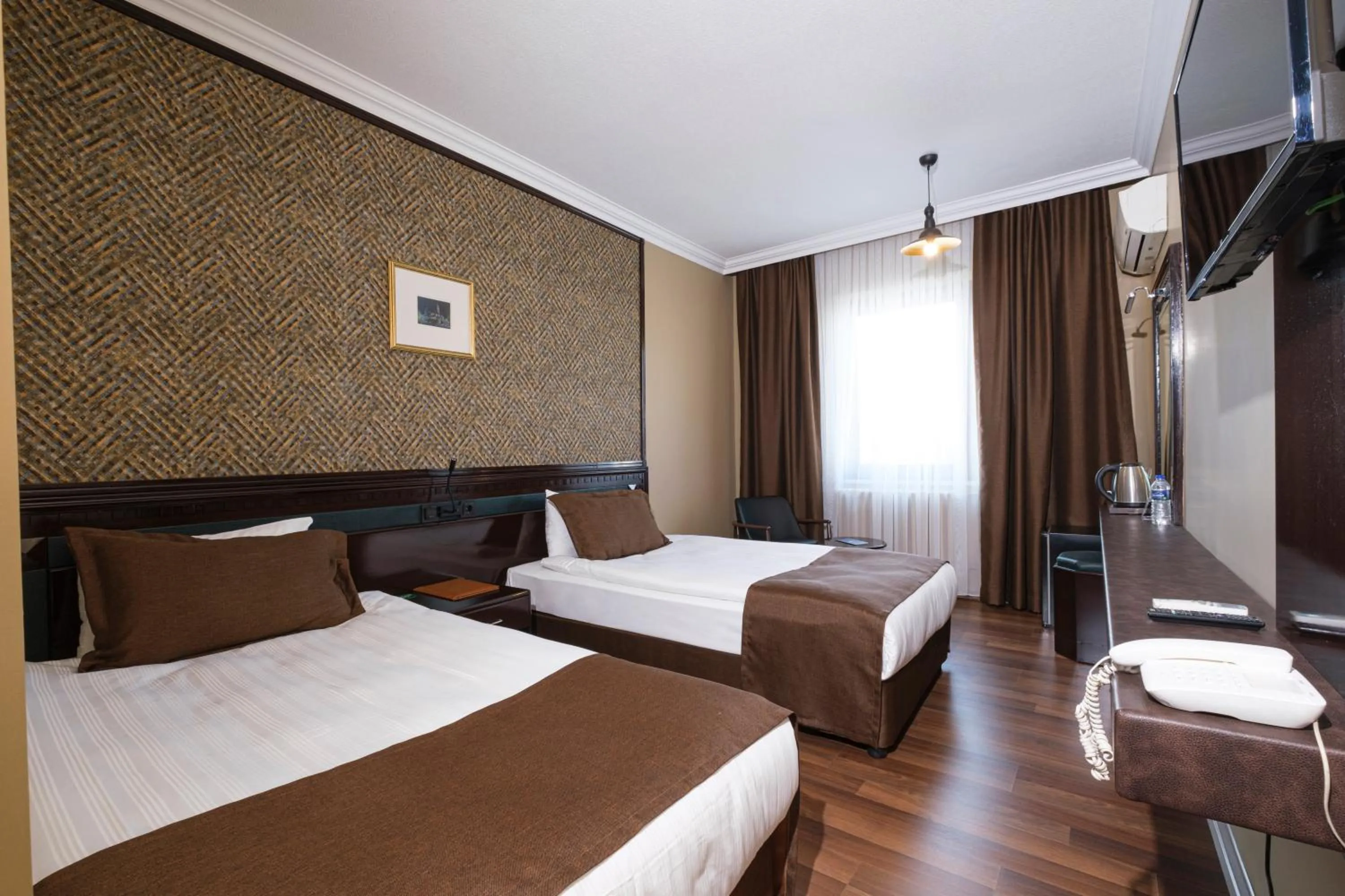 Bed in Balikcilar Hotel