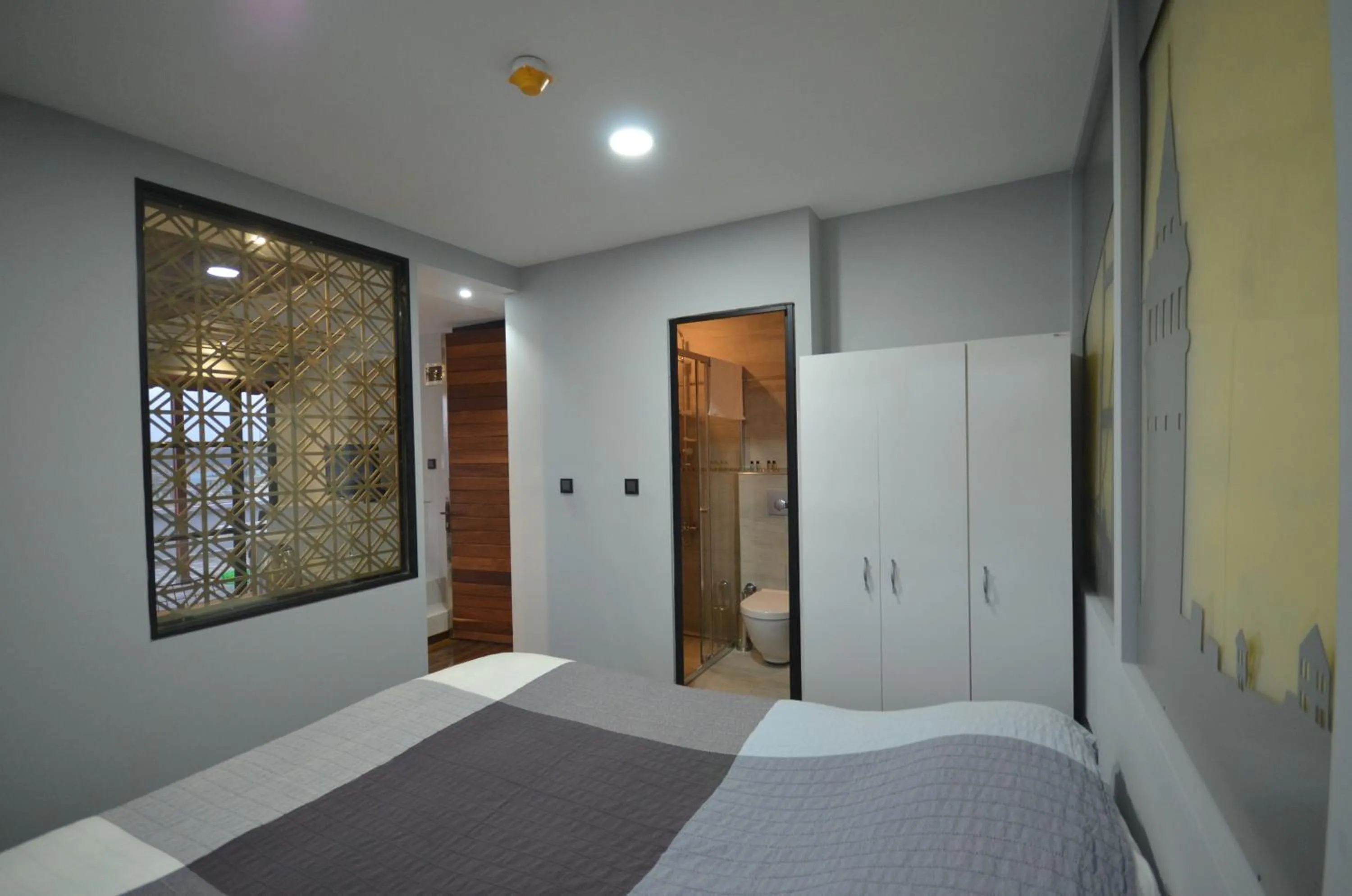 Bed in Ünver Galata Apart