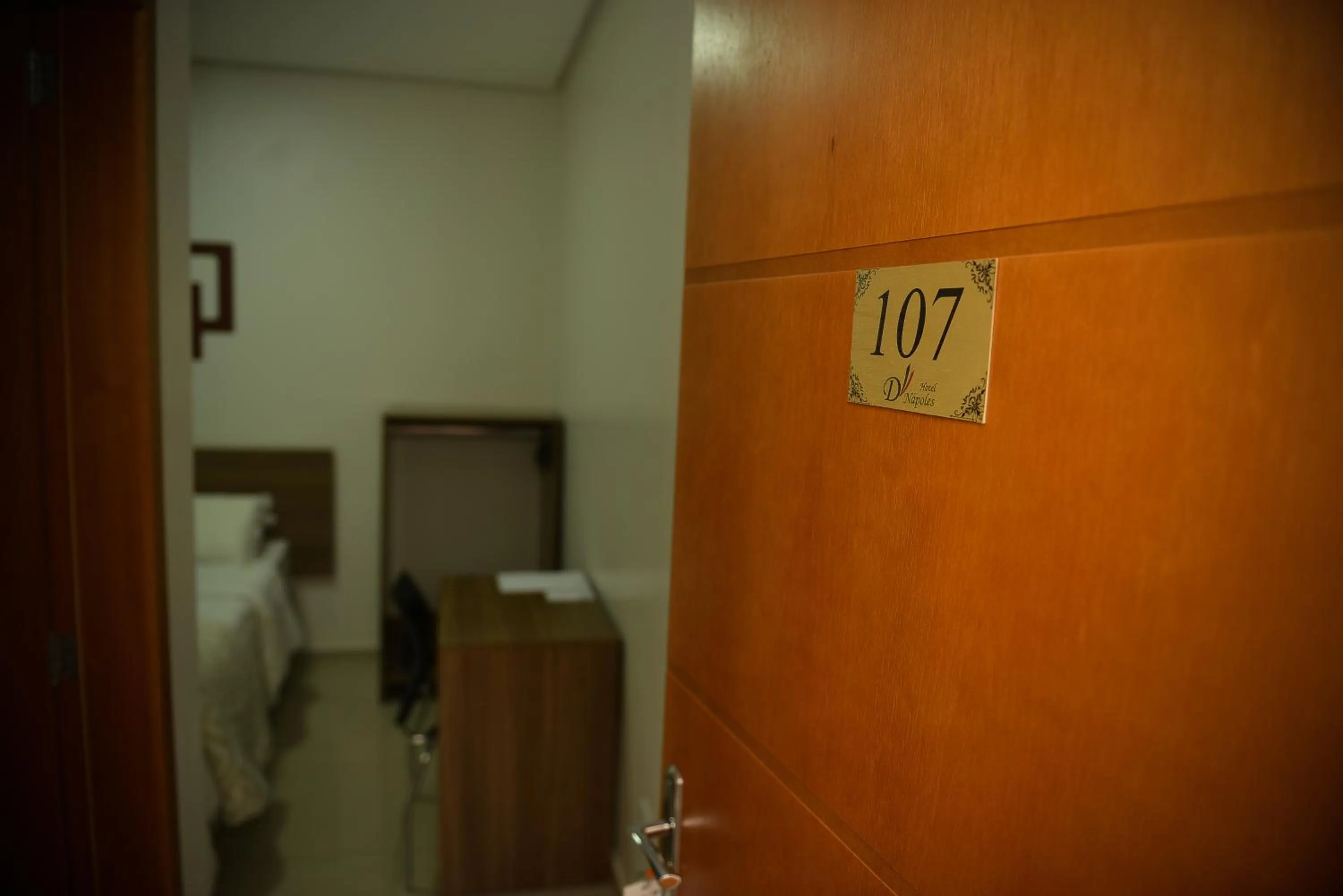 Bedroom in Hotel D'Nápoles