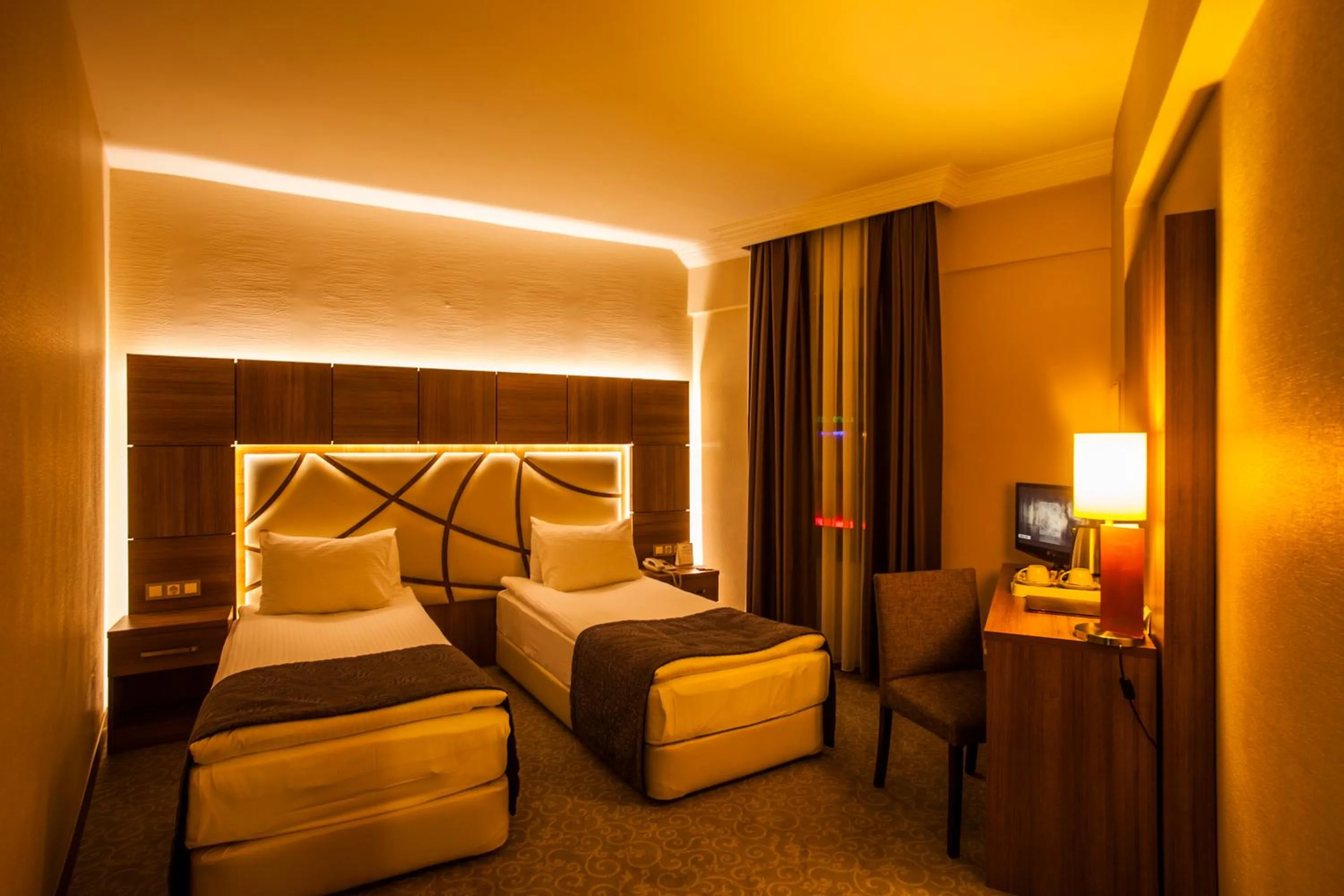 Living room, Bed in Rumi Hotel