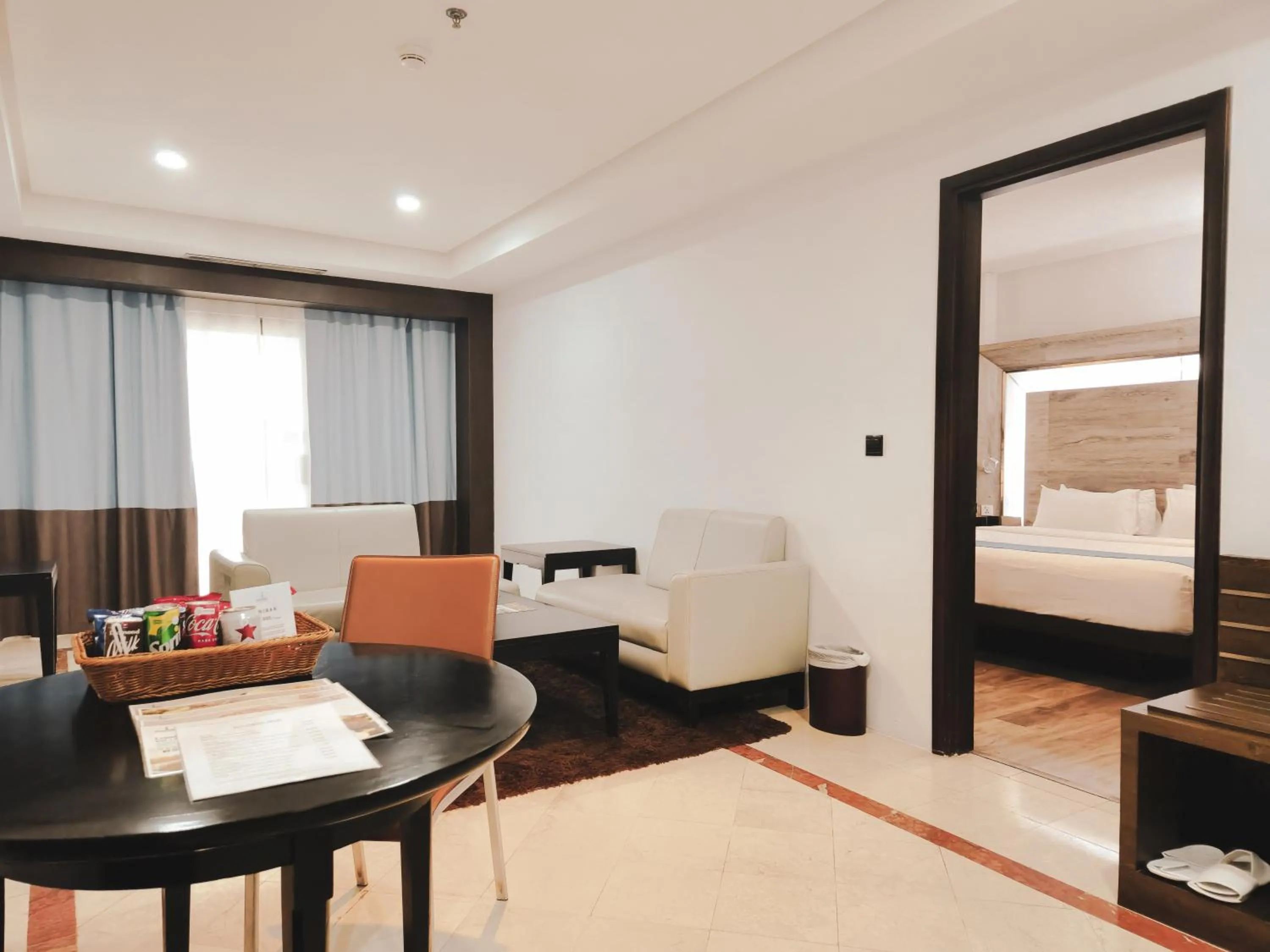 Living room, Bed in AP Premier Batam