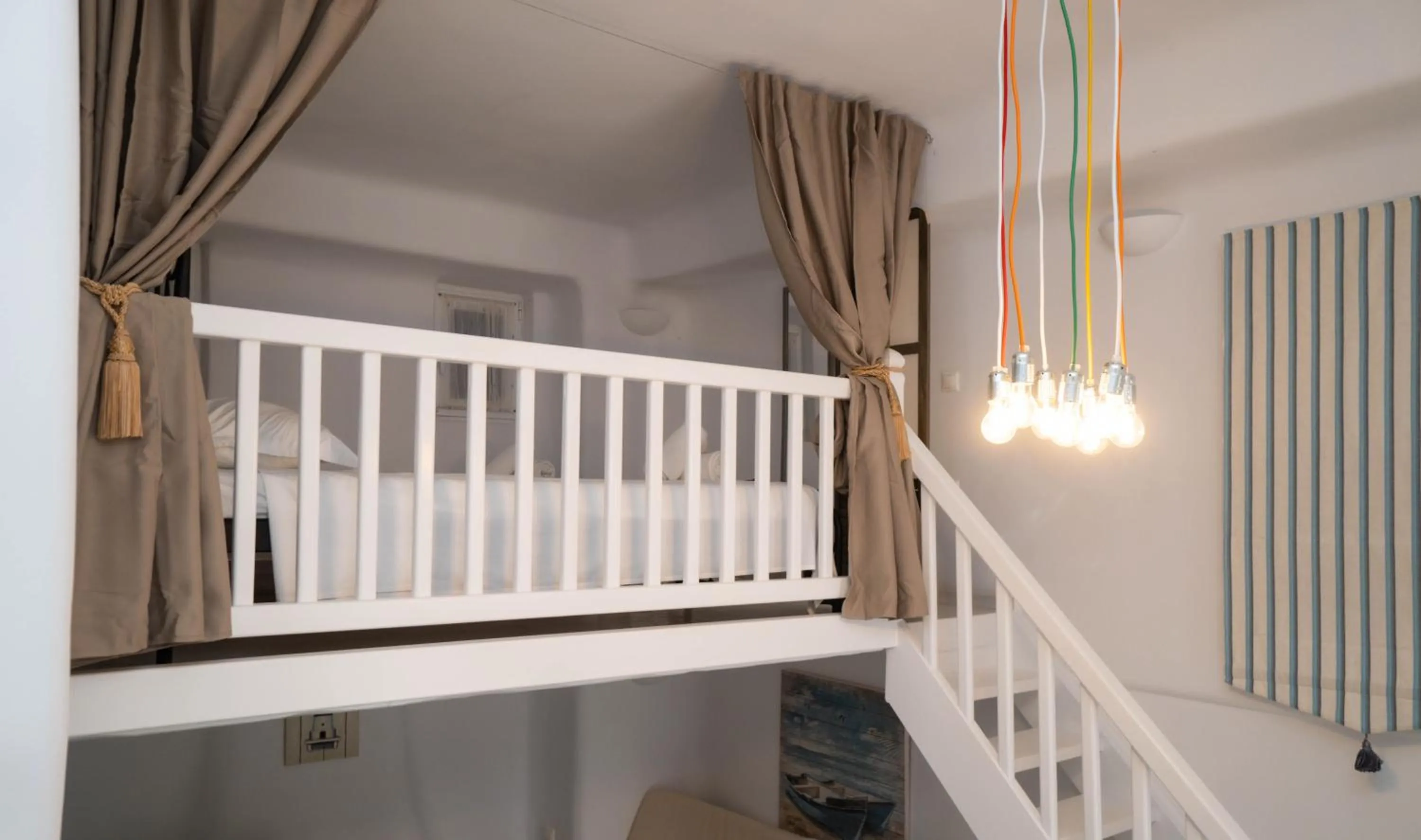 Bed in Mykonian Iros Suites & Villas