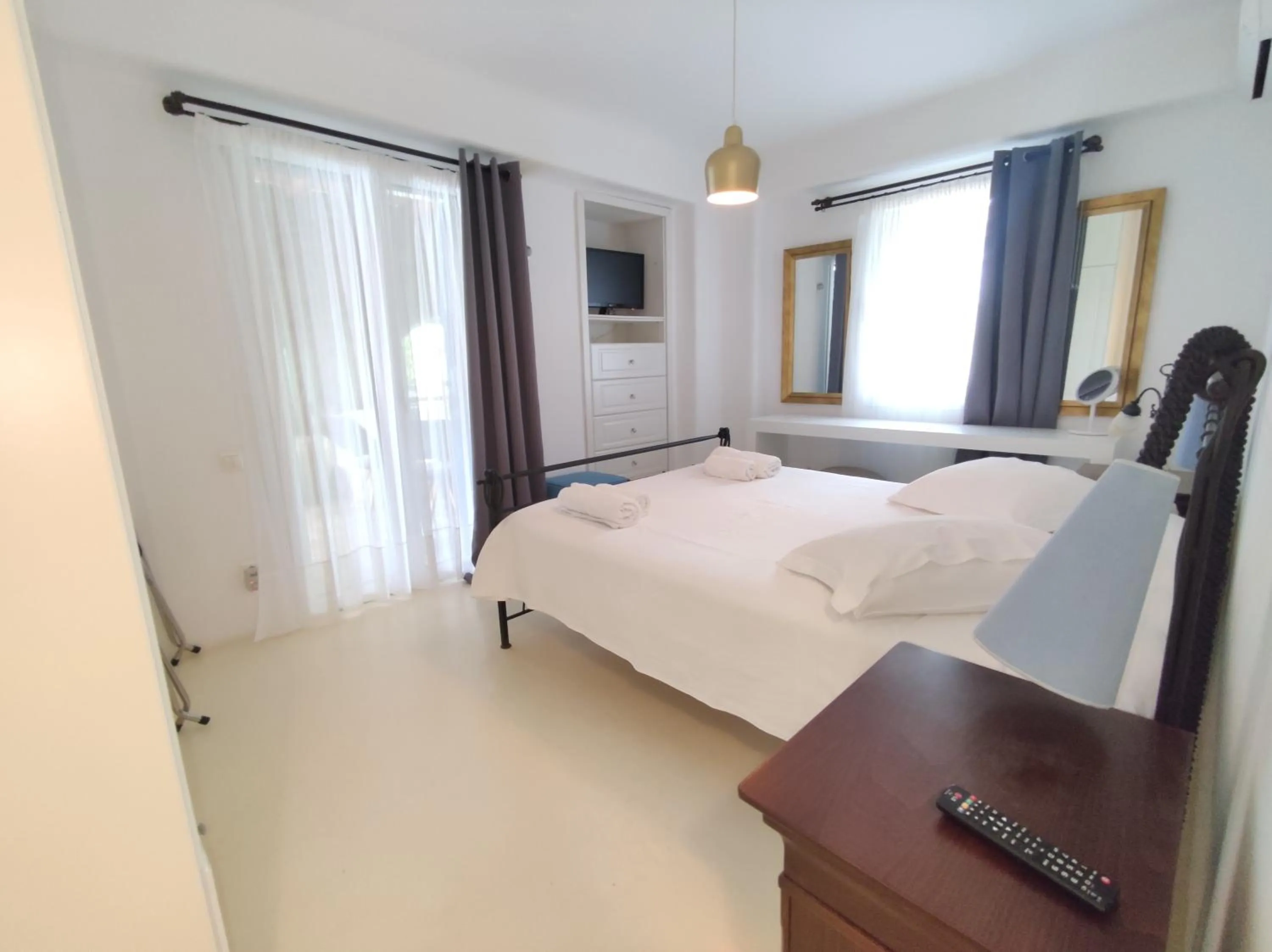 TV and multimedia in Mykonian Iros Suites & Villas