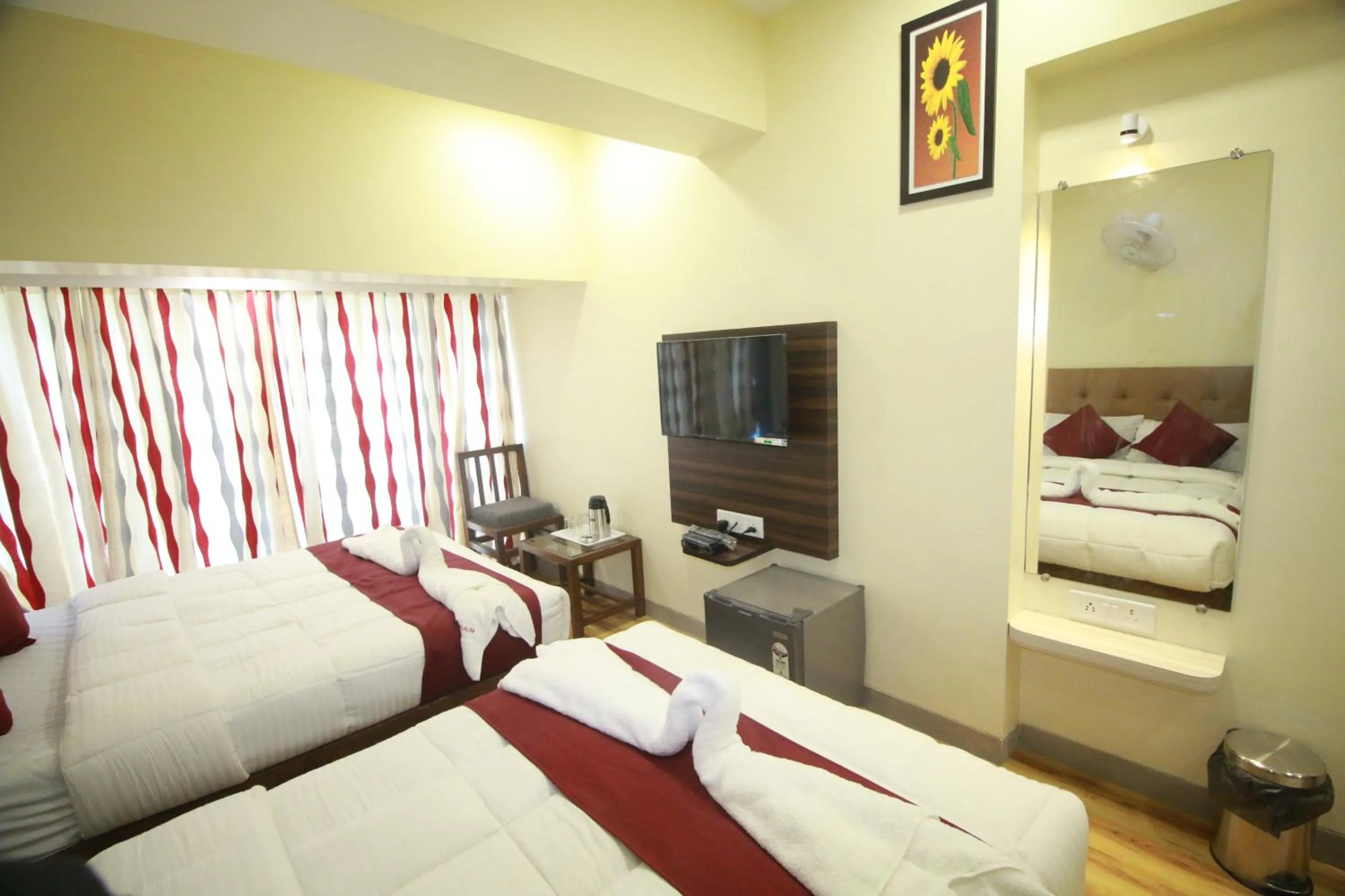 TV and multimedia, Bed in Hotel Alfa International Near Nanavati Hospital Mumbai Near Airport Mumbai Near Juhu Beach