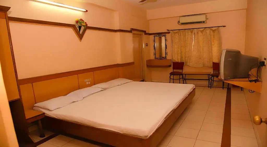Deluxe Family Room in Hotel Vishnu Residency Deluxe Family Room in Hotel Vishnu Residency