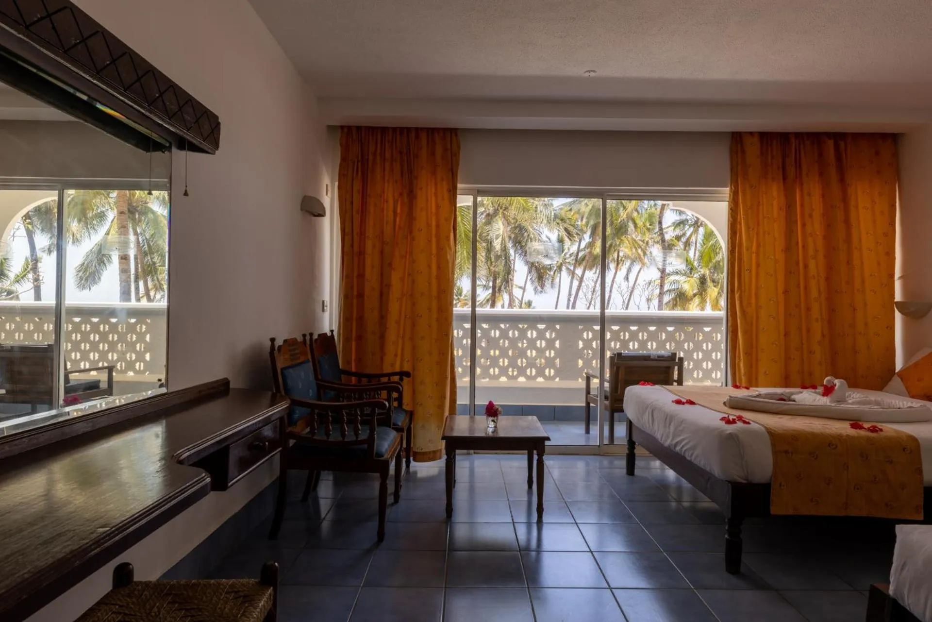 Bedroom, Bed in Sun N Sand Beach Resort