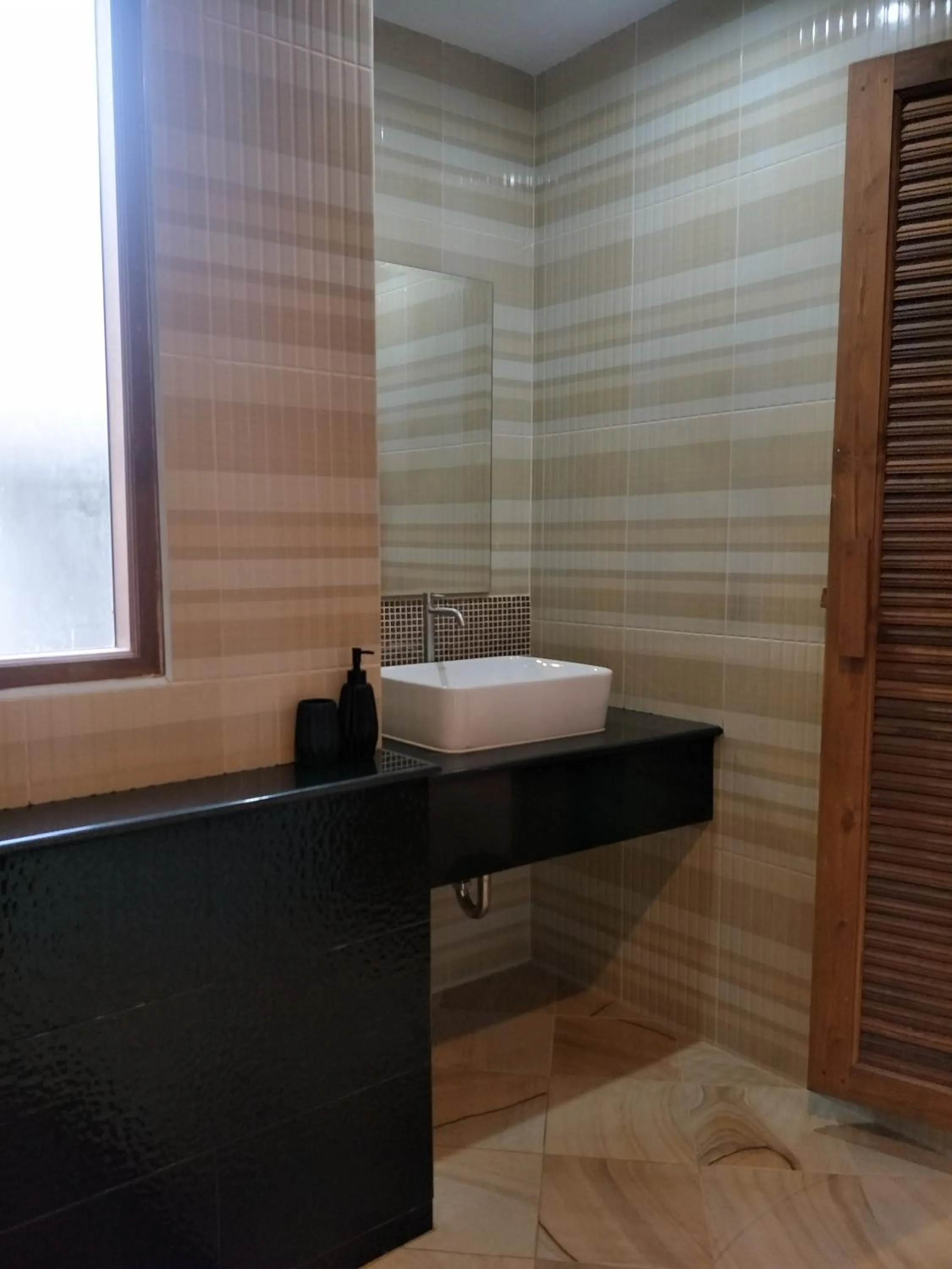 Bathroom in Lanta Infinity Resort - SHA Extra Plus