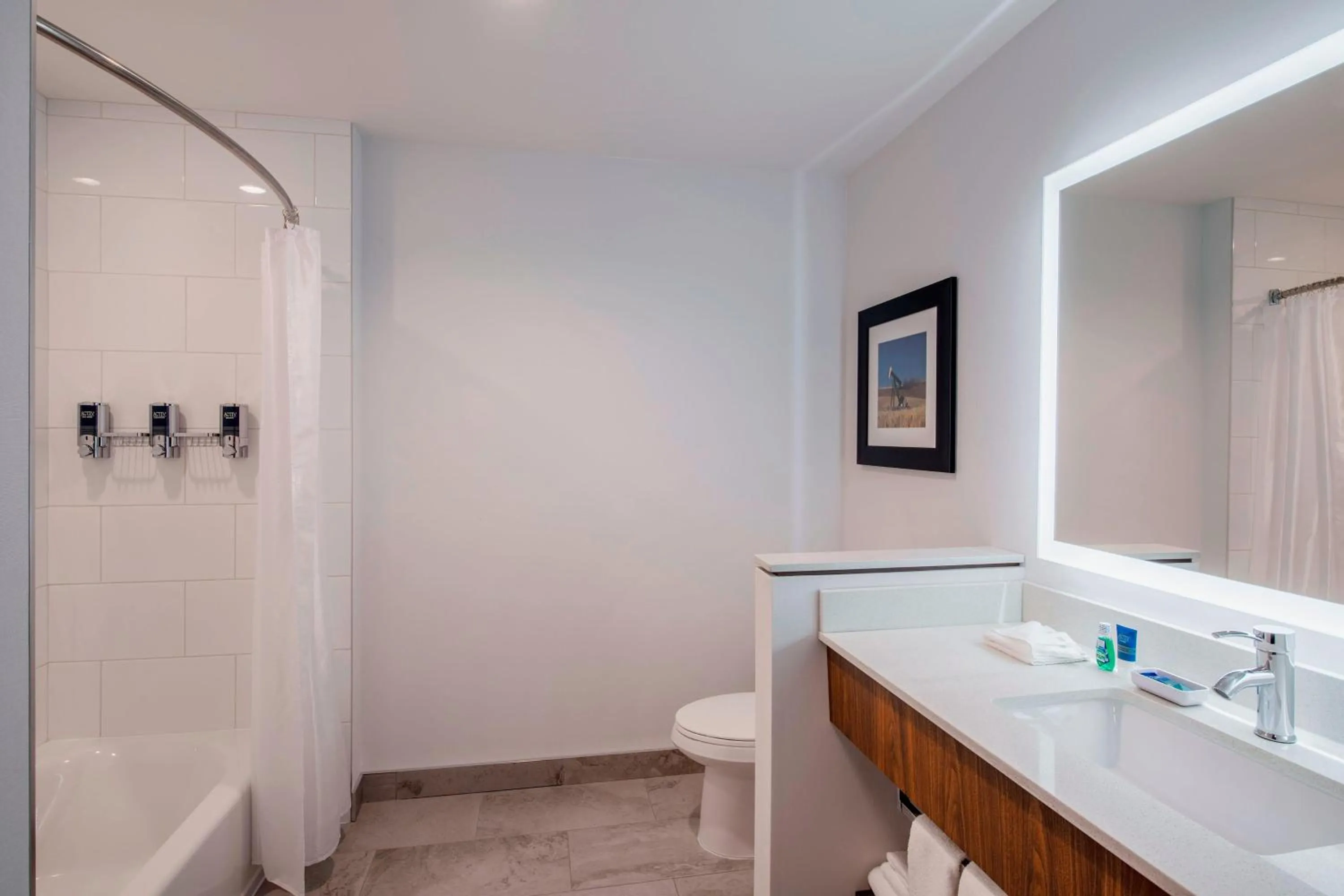 Bathroom in Four Points by Sheraton Grande Prairie