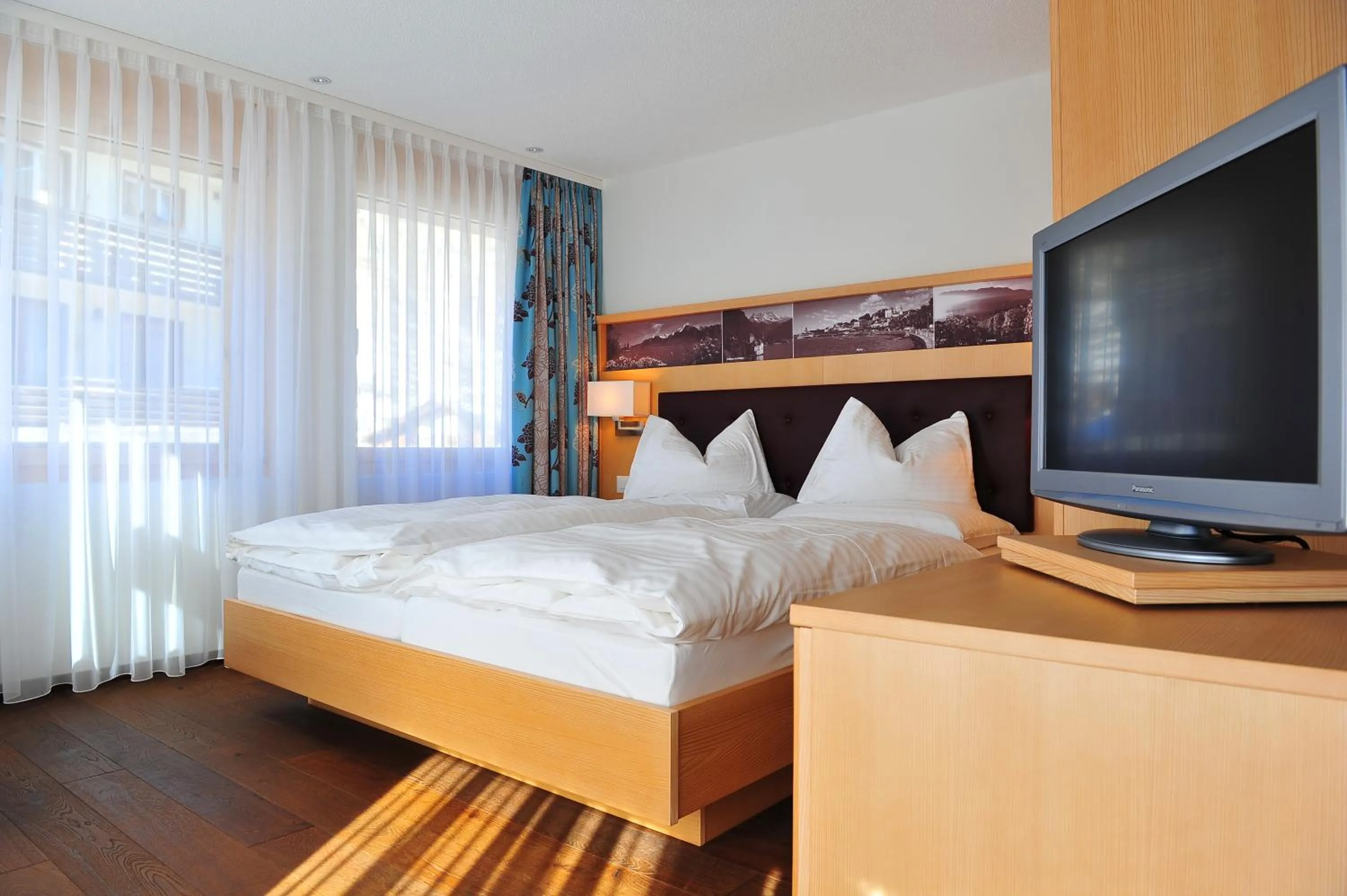 Photo of the whole room, Bed in Hotel Aristella Swissflair