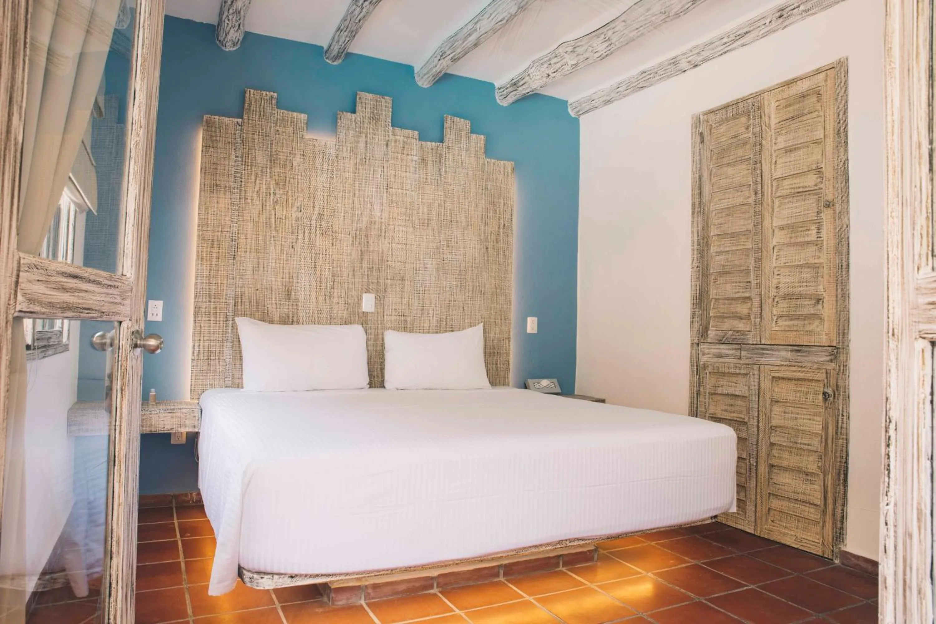 Bed in Holbox Dream Beachfront Hotel