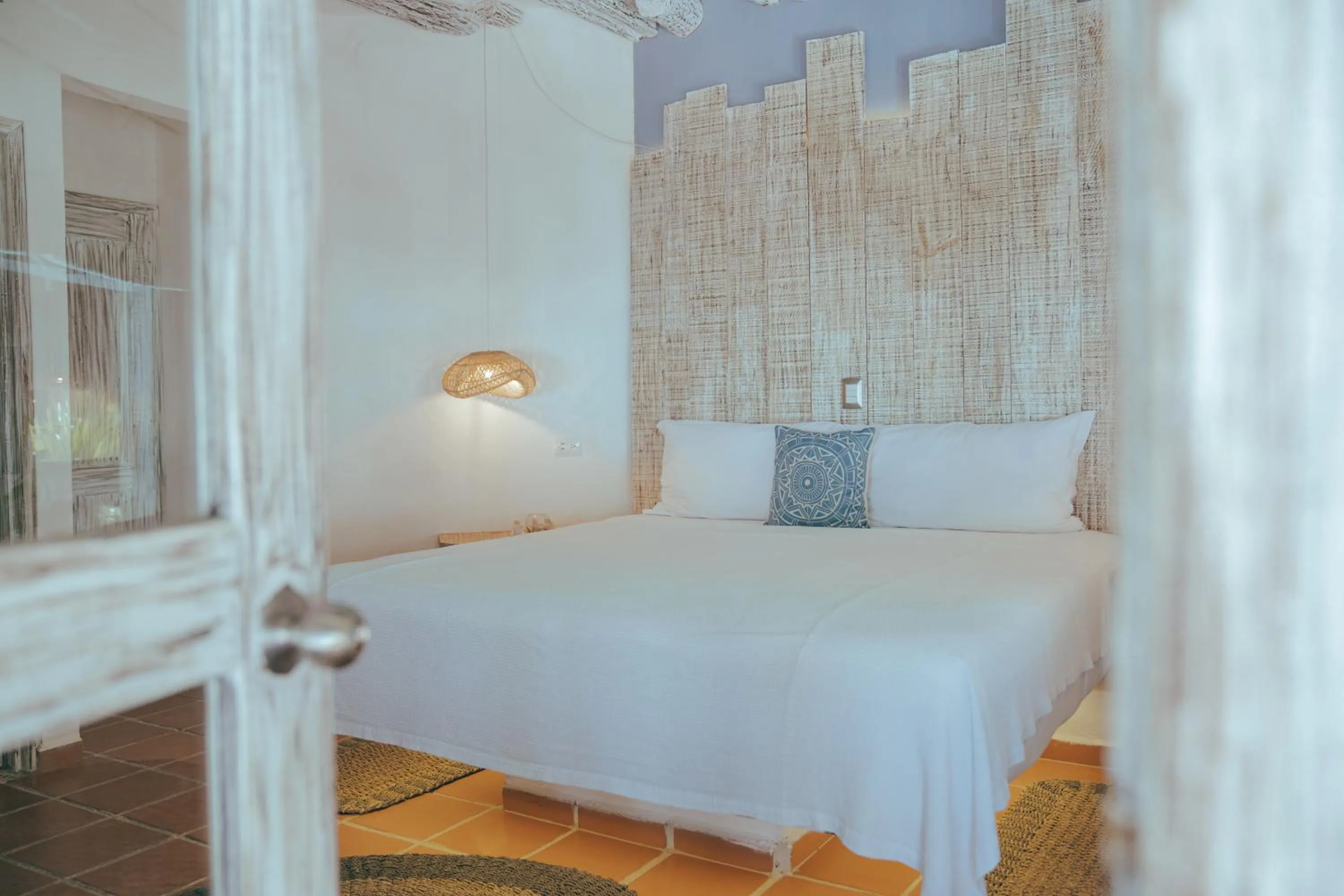 Bed in Holbox Dream Beachfront Hotel