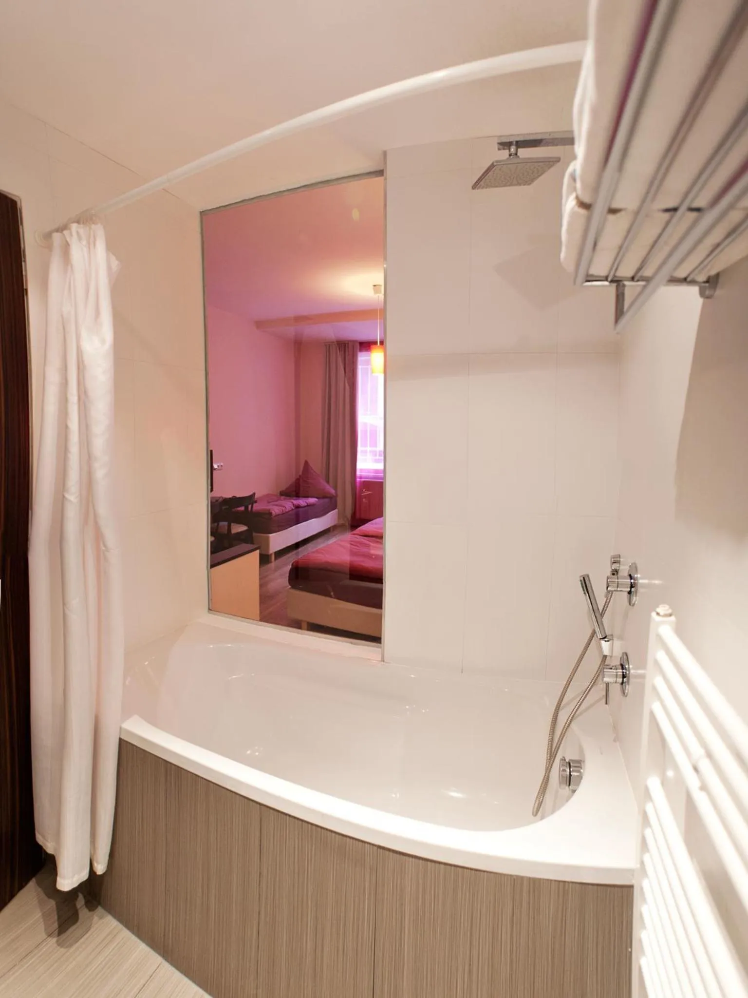 Bathroom, Bed in Hotel PurPur