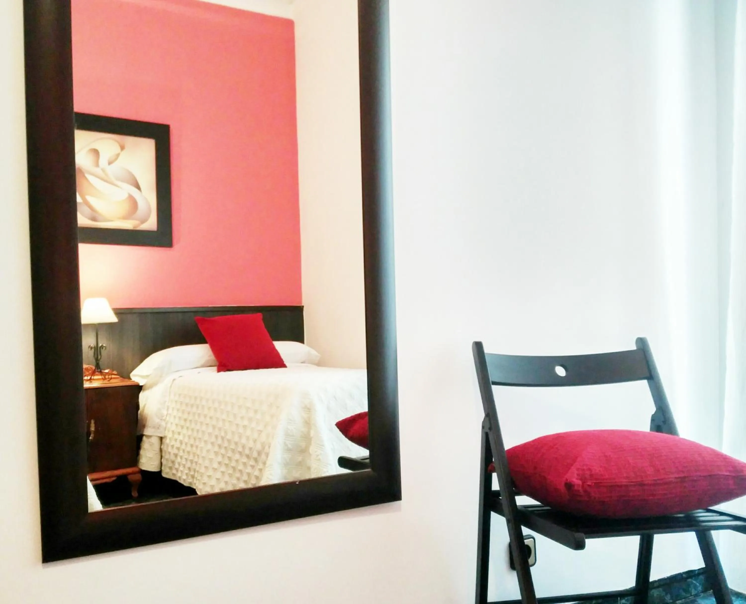 Decorative detail, Bed in Hostal Bruña Paseo del Prado