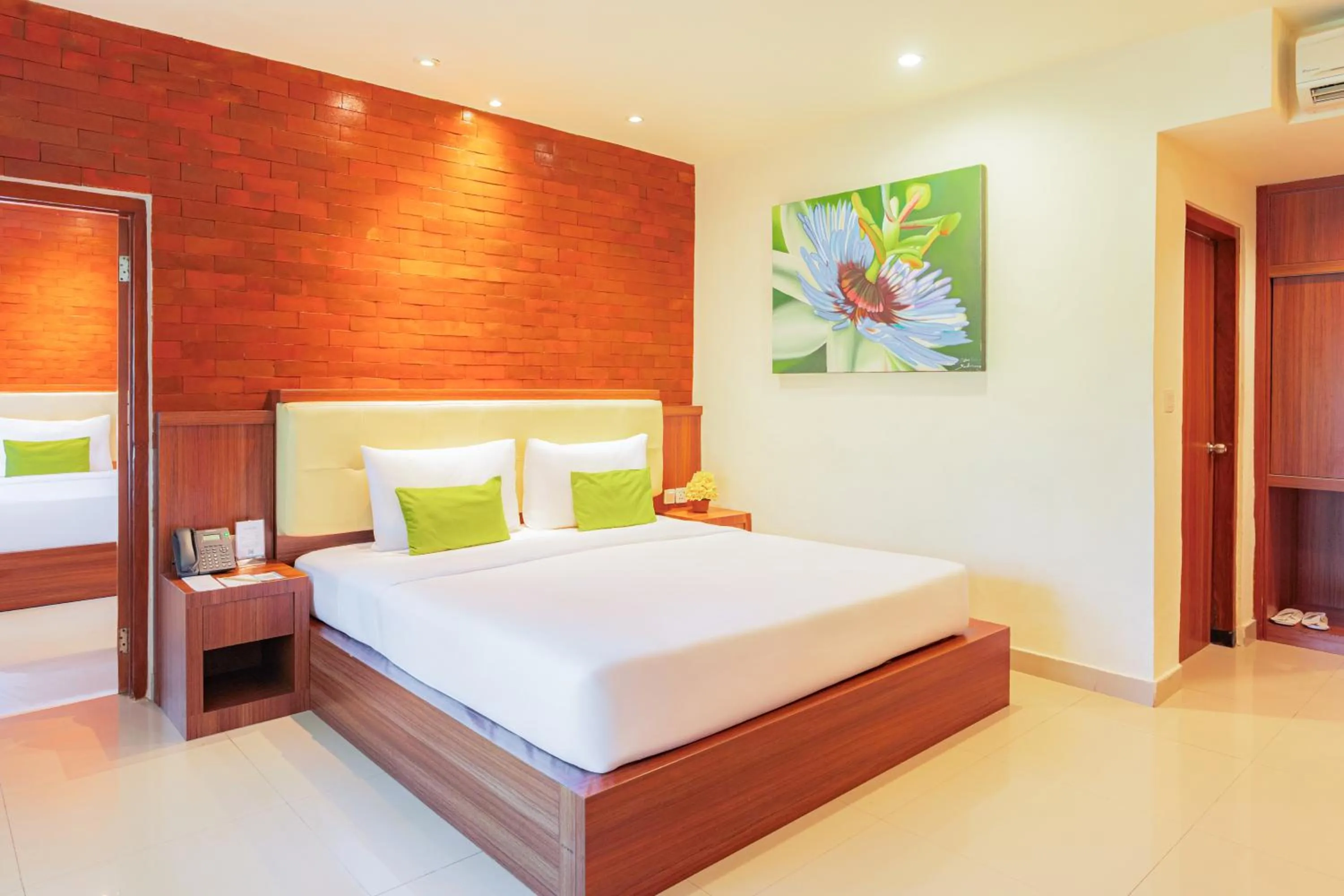 Bed in Wina Holiday Villa Kuta Bali