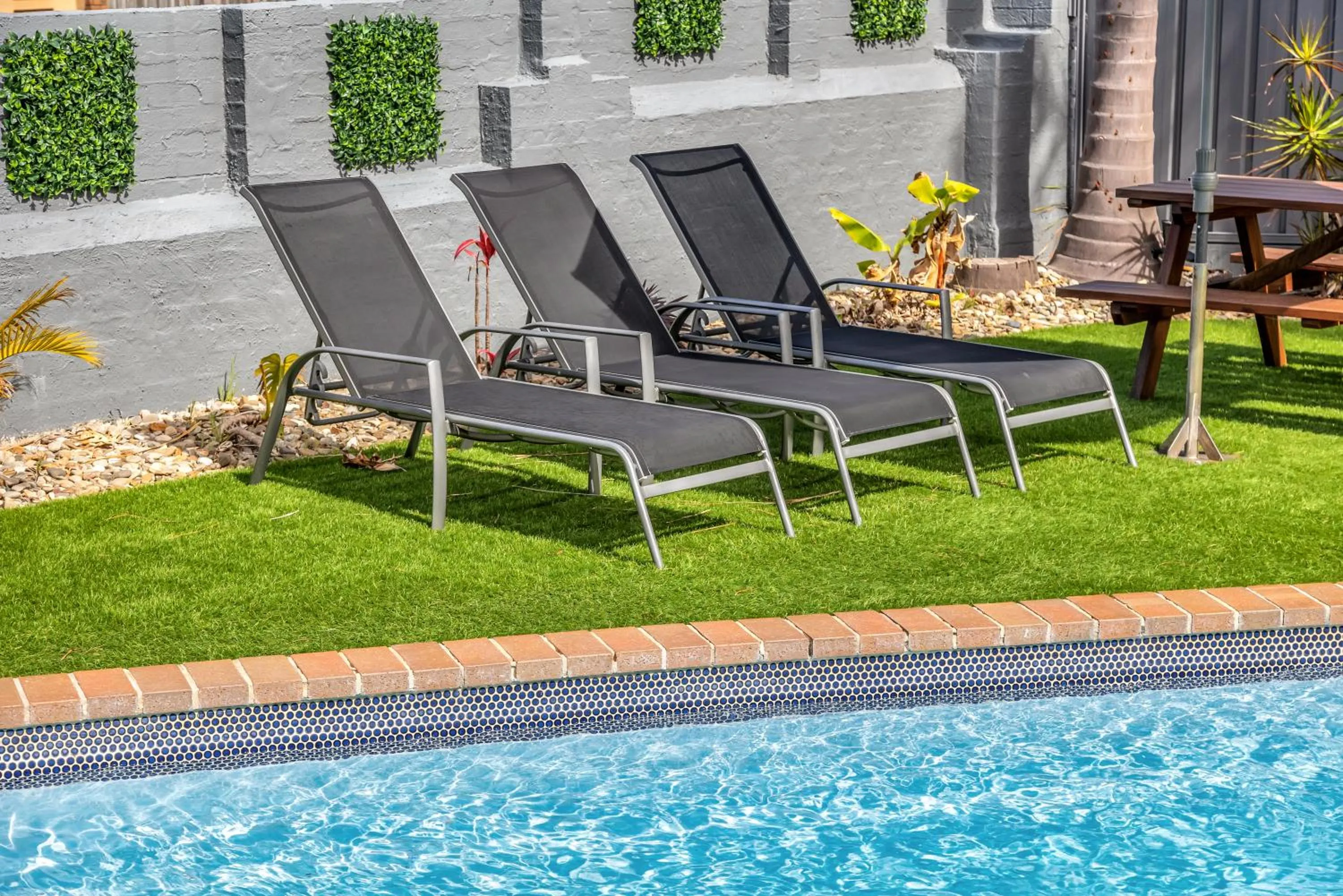 Swimming pool in The Palms Apartments