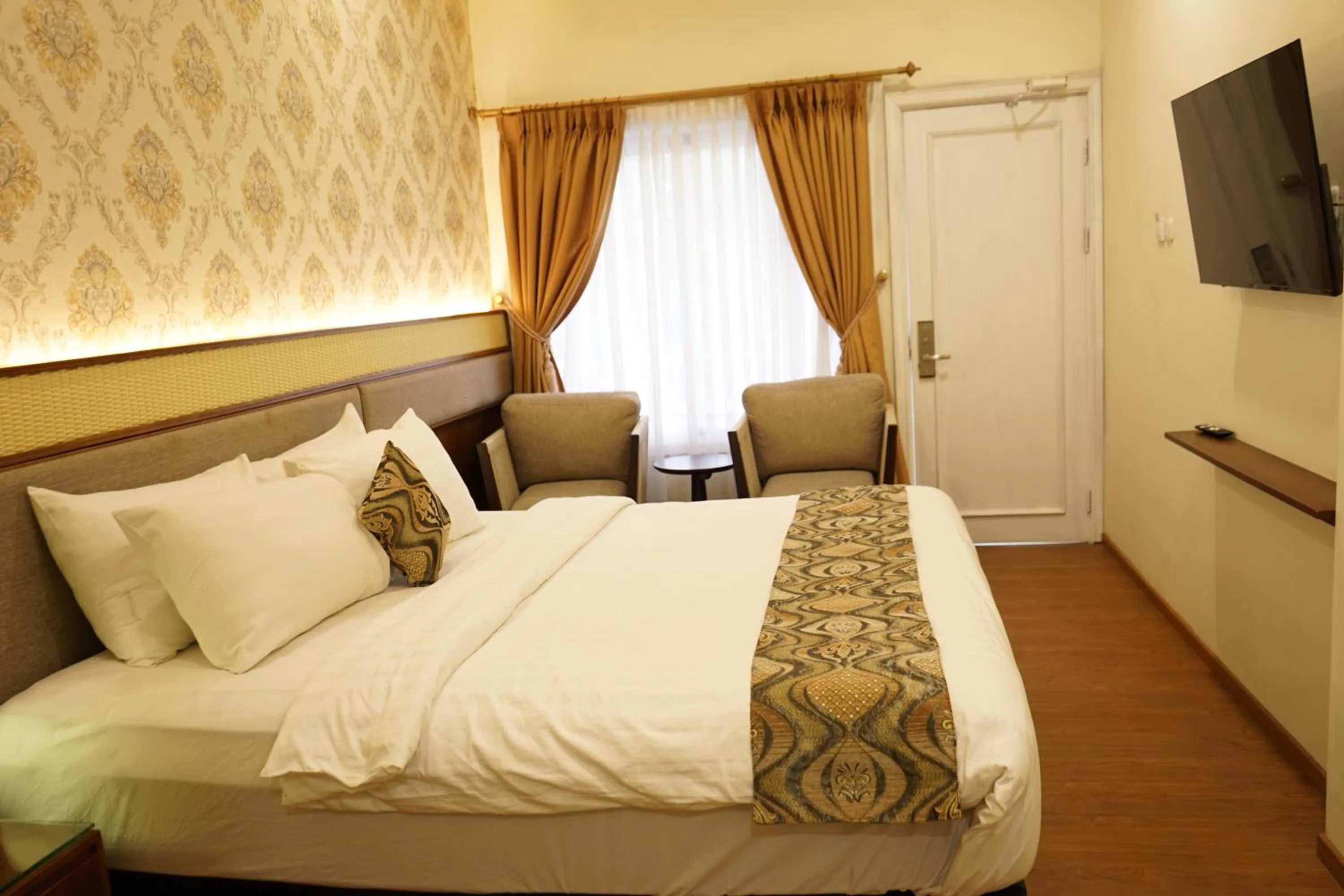 Bed in Hotel Indah Palace Tawangmangu