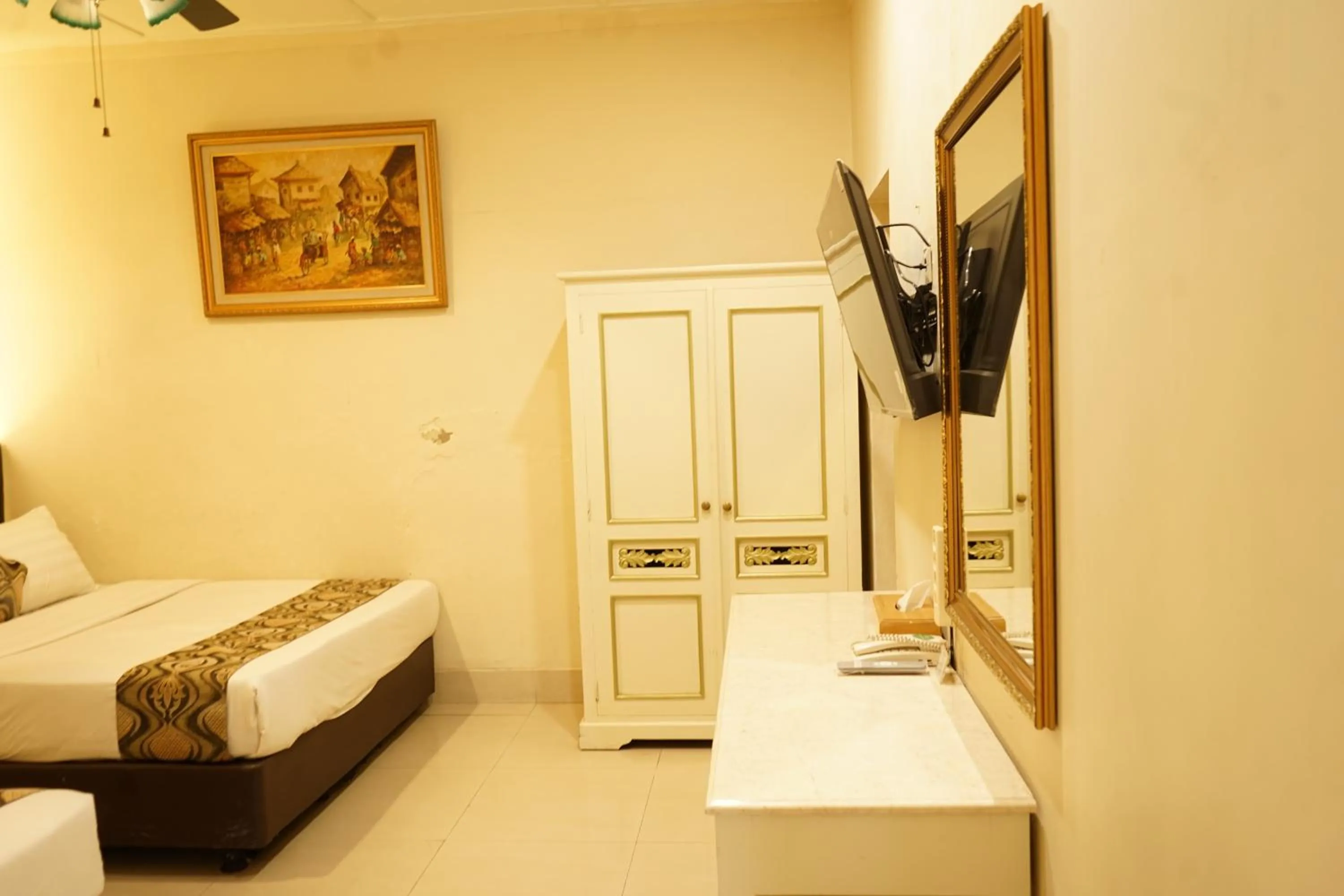 furniture, Bed in Hotel Indah Palace Tawangmangu