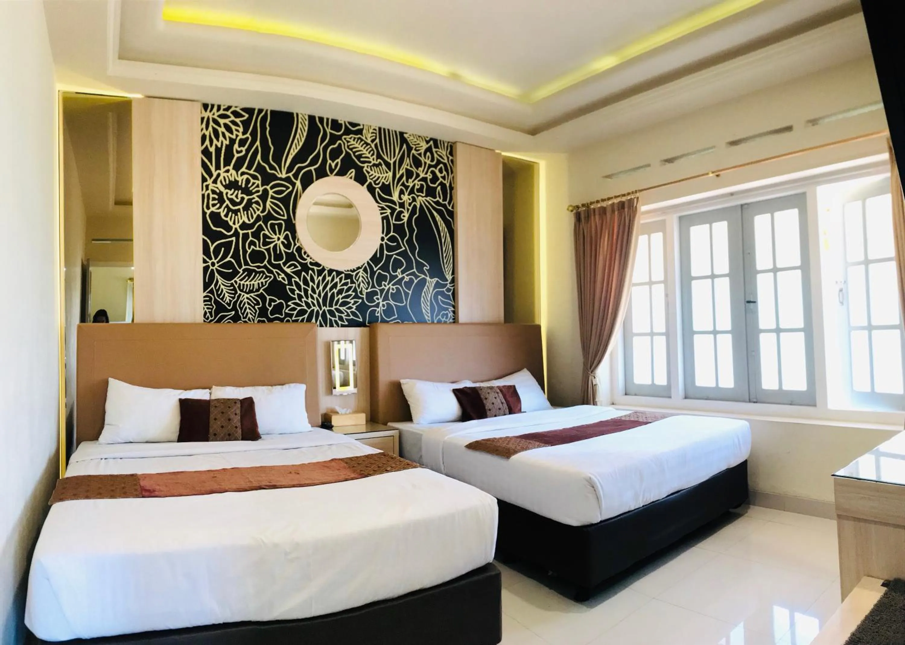 Bed in Hotel Indah Palace Tawangmangu