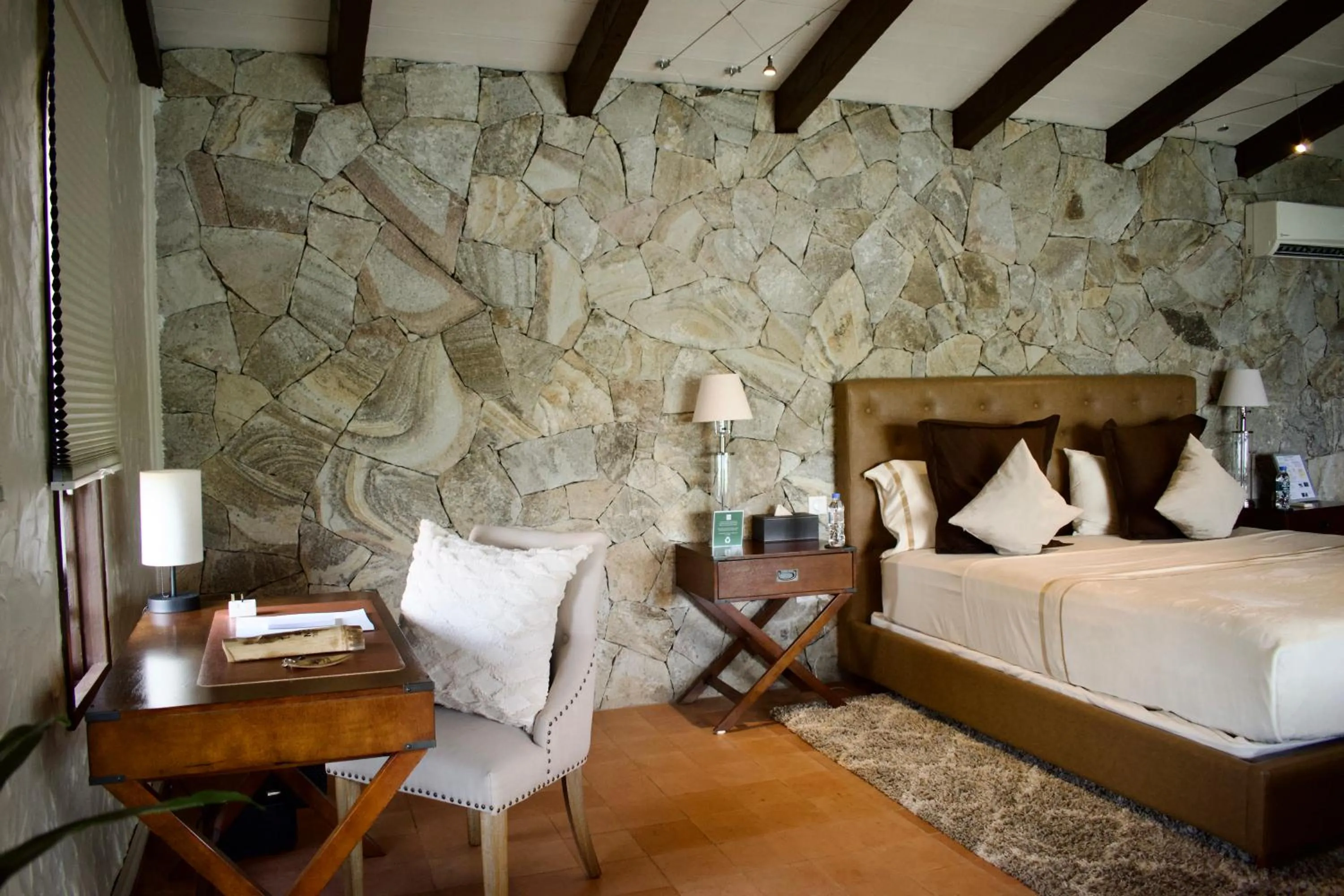 Seating area, Bed in Secret Harbour Boutique Hotel and Marina