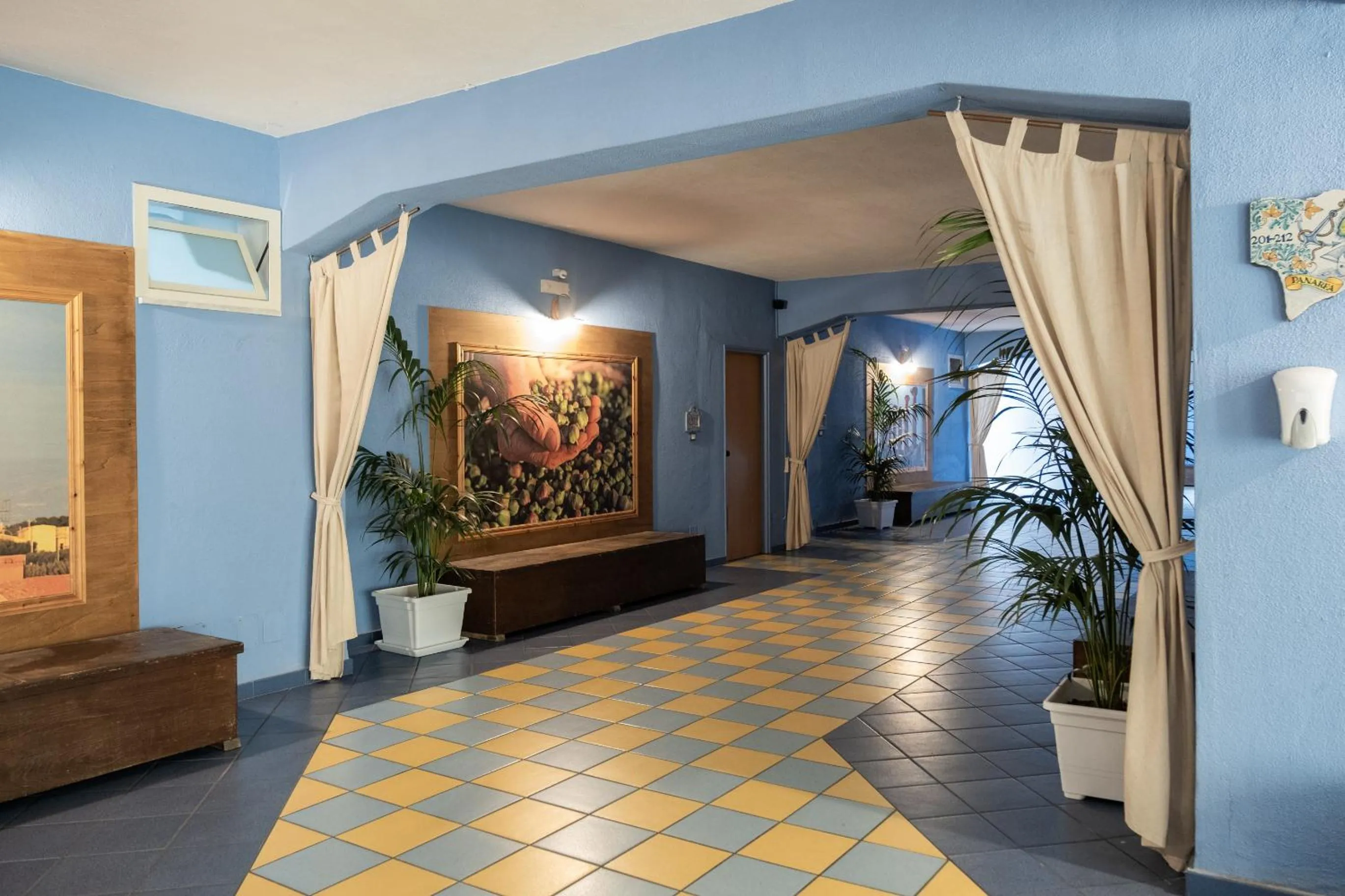 Communal lounge/ TV room in Oasi Azzurra