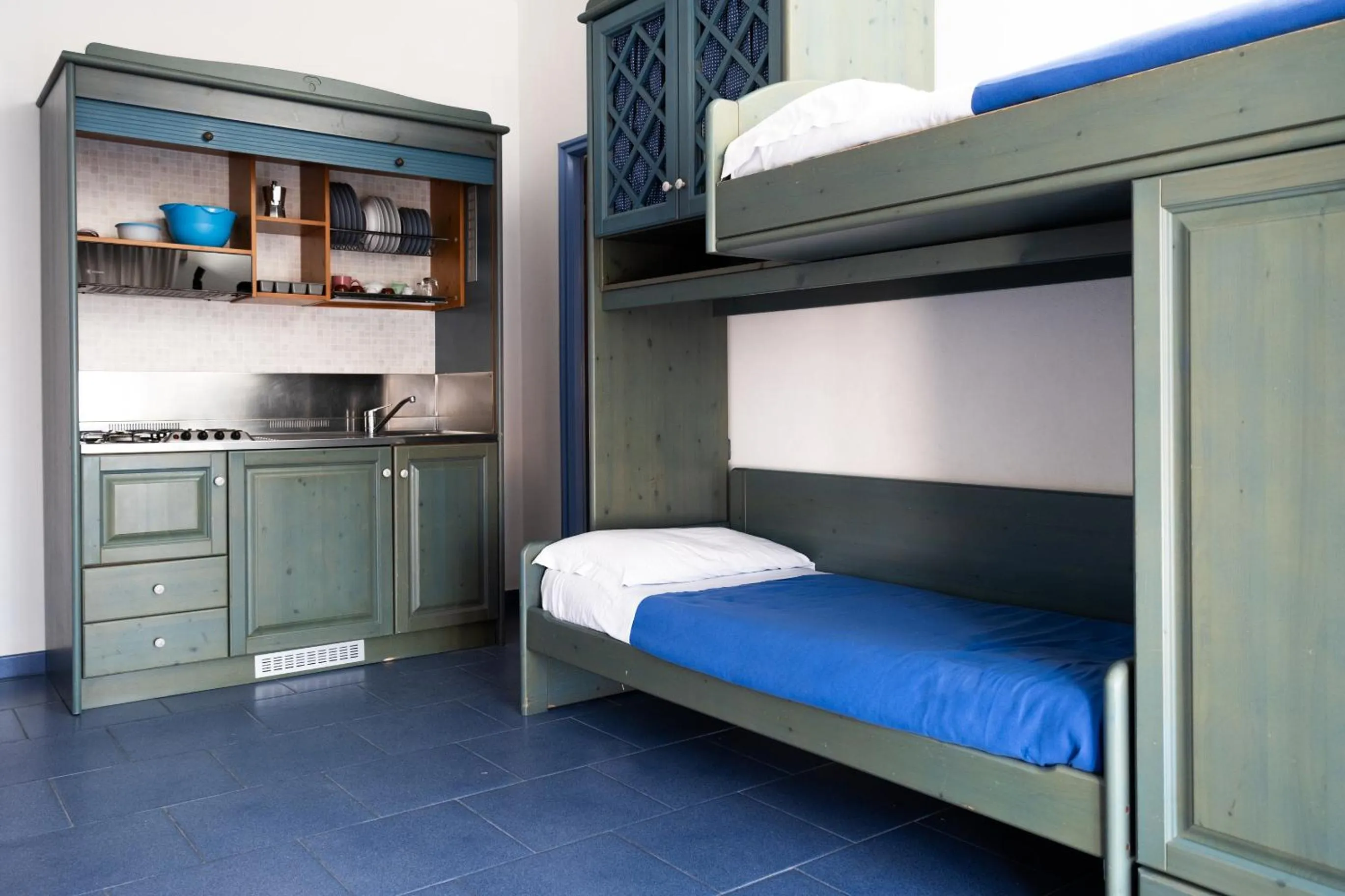 Kitchen or kitchenette, Bed in Oasi Azzurra