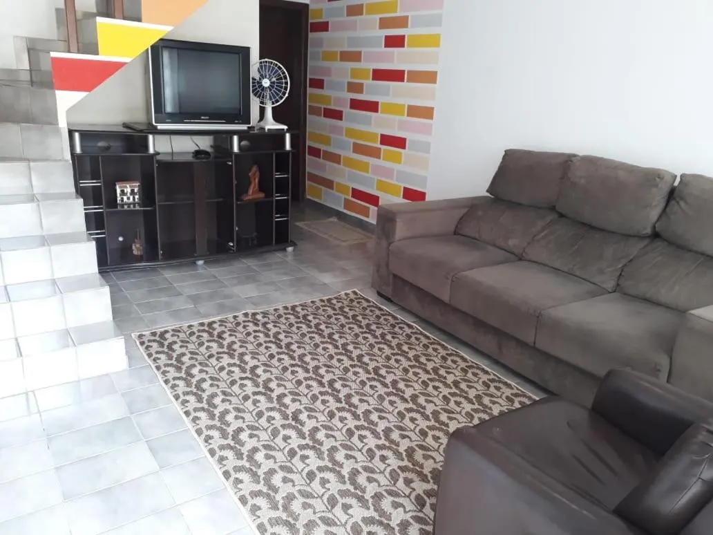 Living room in Conforto na praia