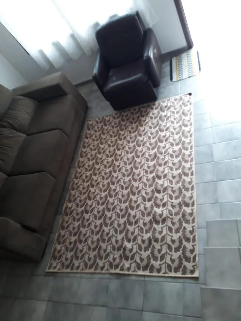 Living room in Conforto na praia